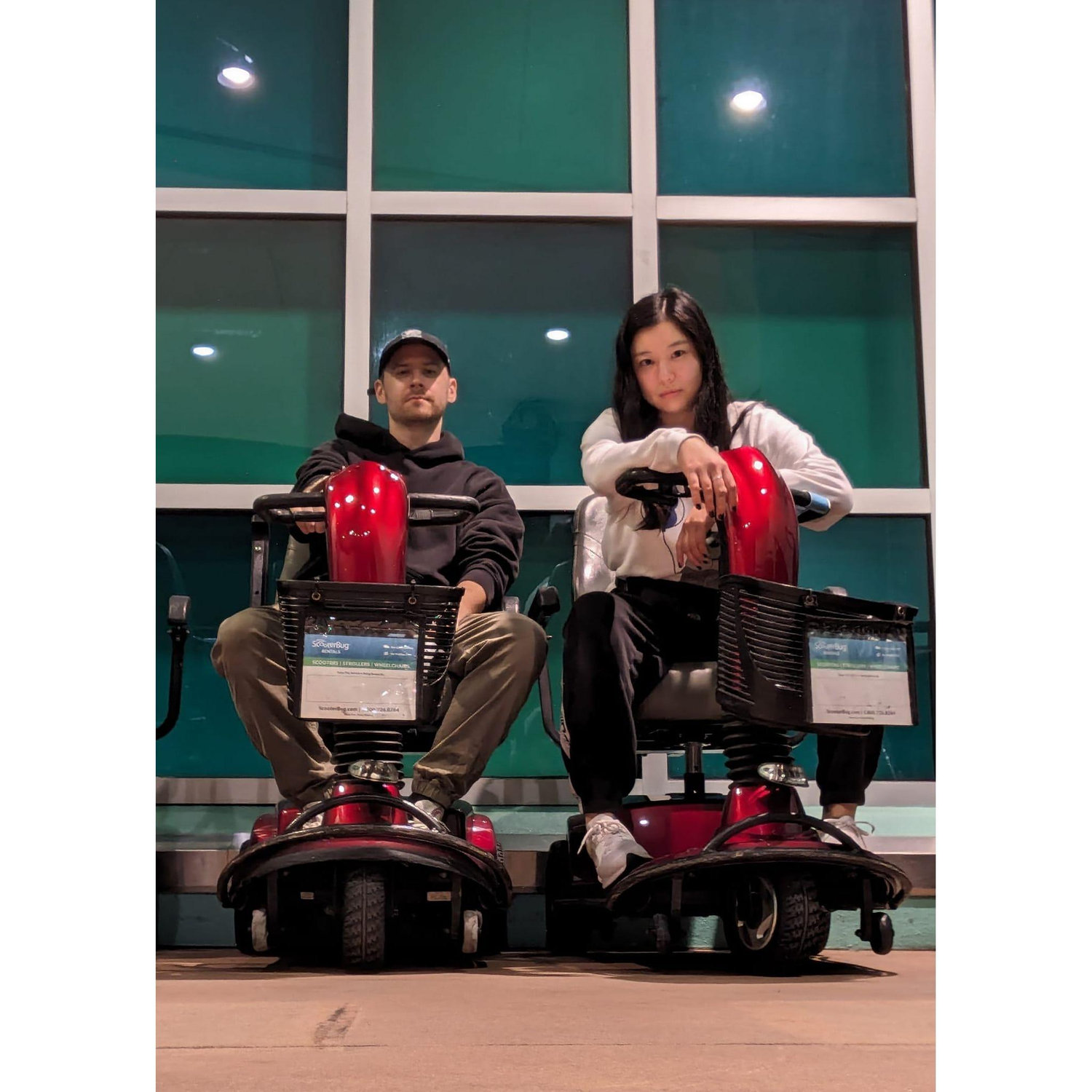 Manifesting our future as a gluttonous old, scooter couple in Disney -- rolling from one food stall to another. (Feb. 2024)
