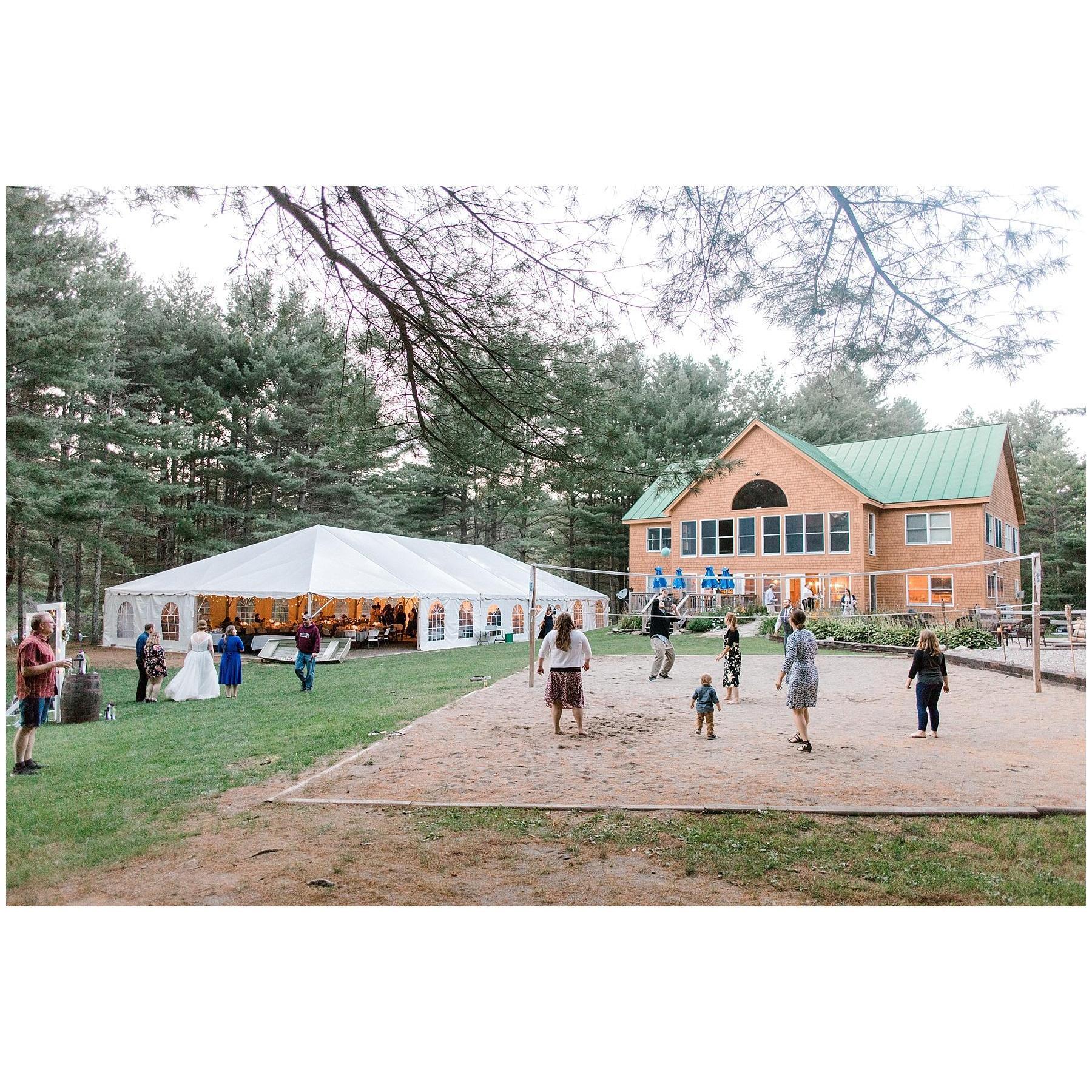 Reception tent, main lodge, and vollyball area