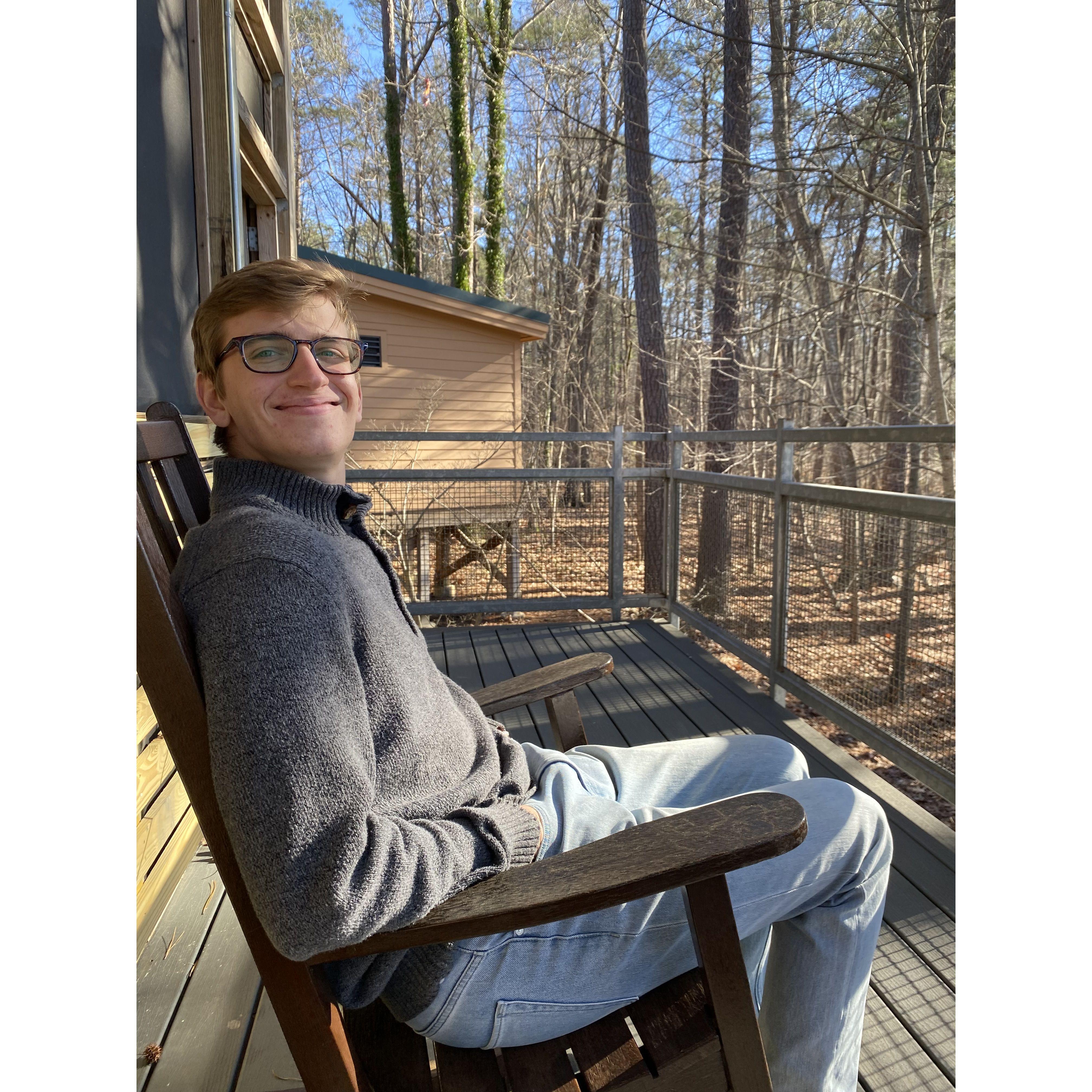 After a long day of touring apartments in NC, we found time to unwind by a lake on some rocking chairs