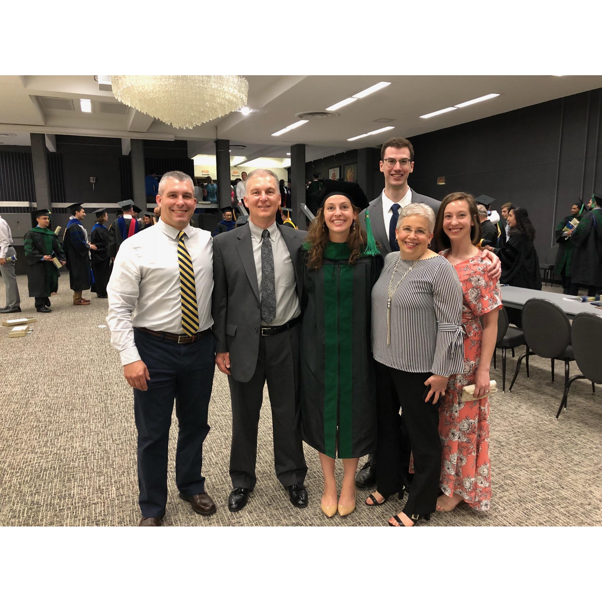 Year 2 - Graduation day! Abby and her family.
