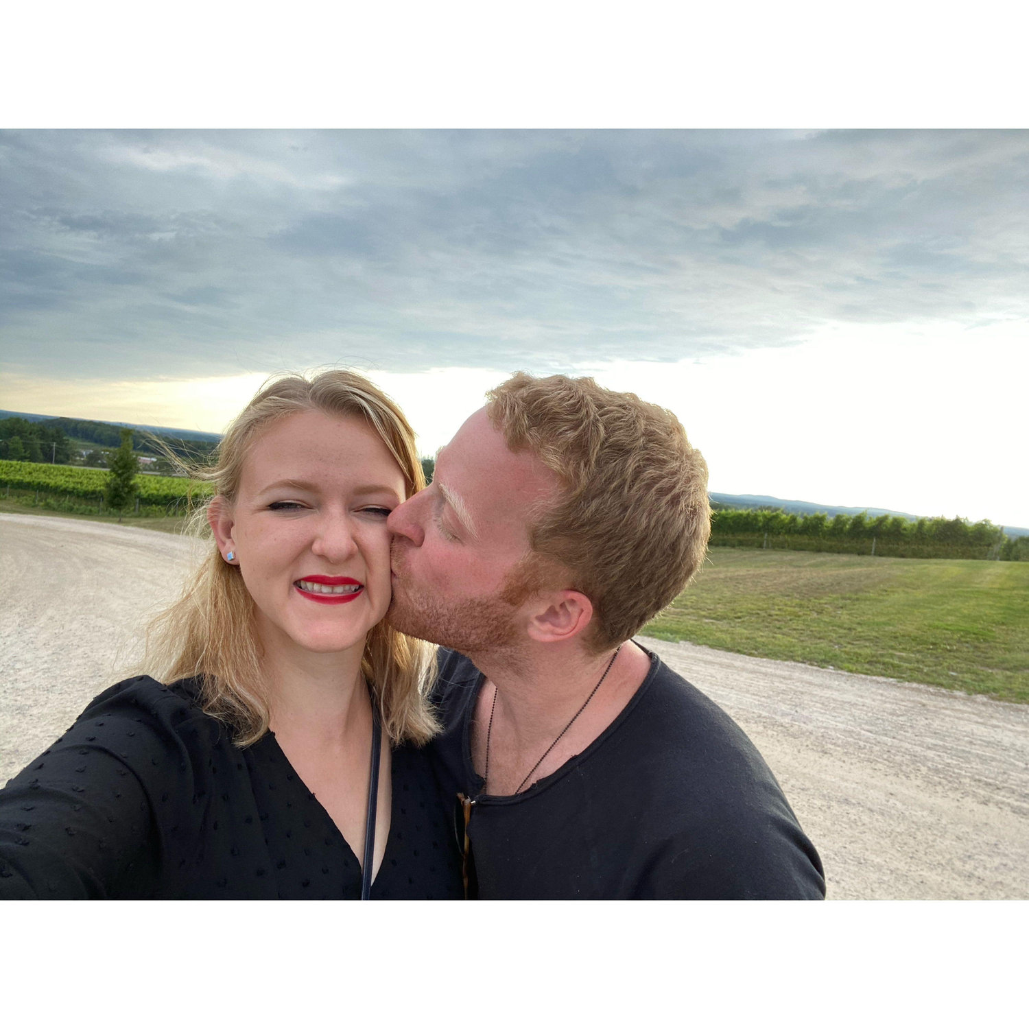 Our first couples vacation together, we went to Traverse City, Michigan. Here we are stopped on the side of the street admiring the vineyards mid-wine tasting.