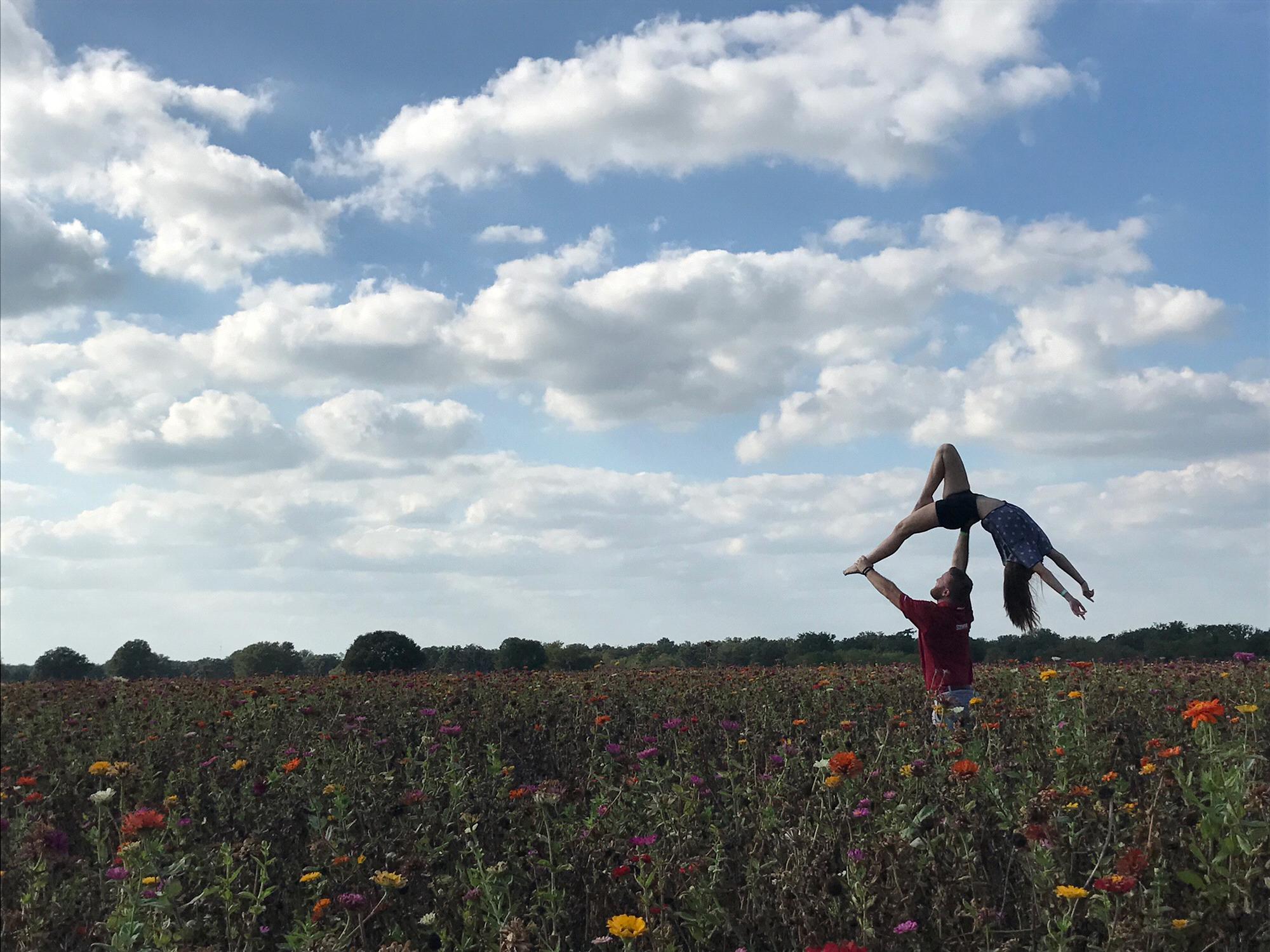 Our first attempt at high backbend. 12 days into dating. Fredericksburg