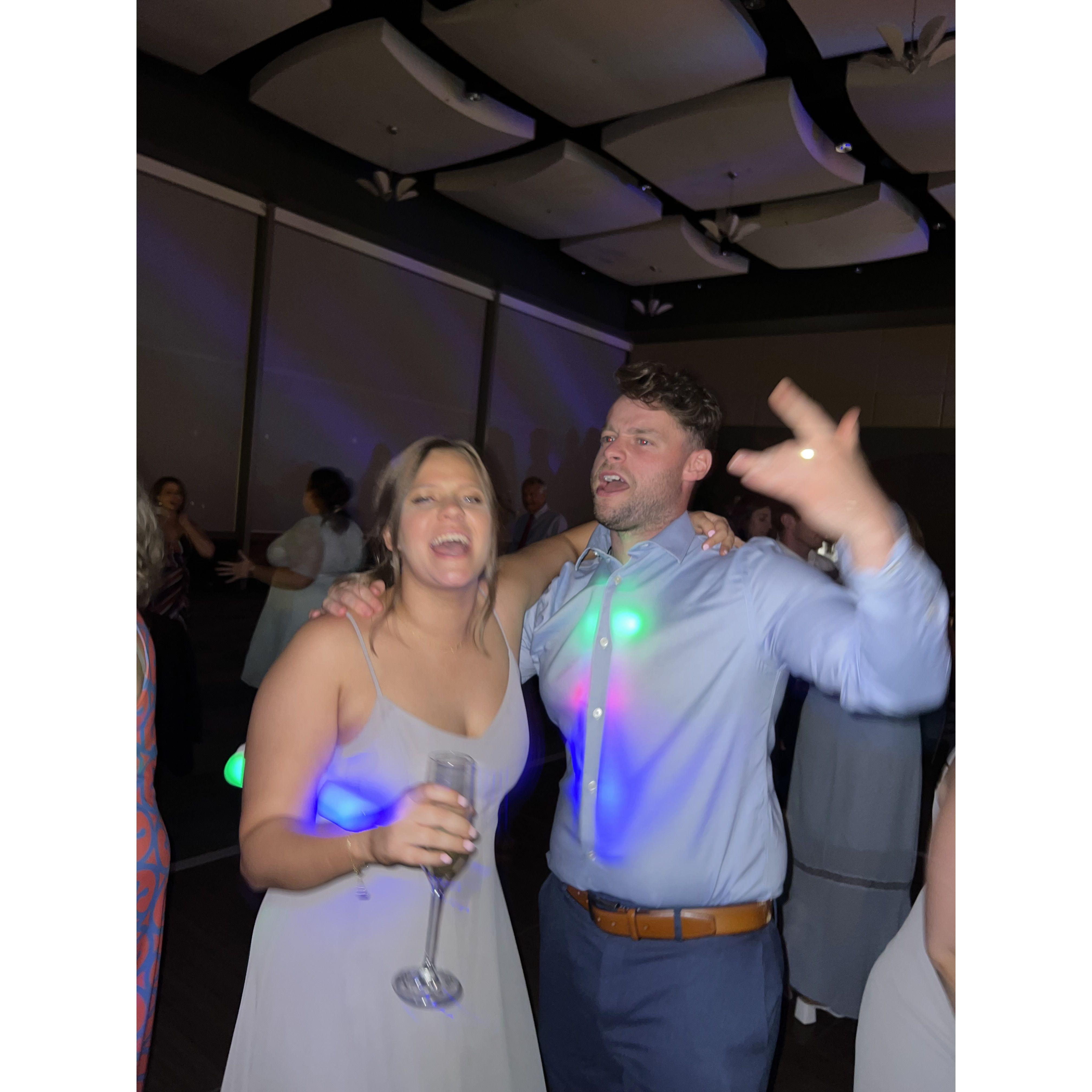 July 2023: Belting Taylor Swift on the dance floor of another friend's wedding :)