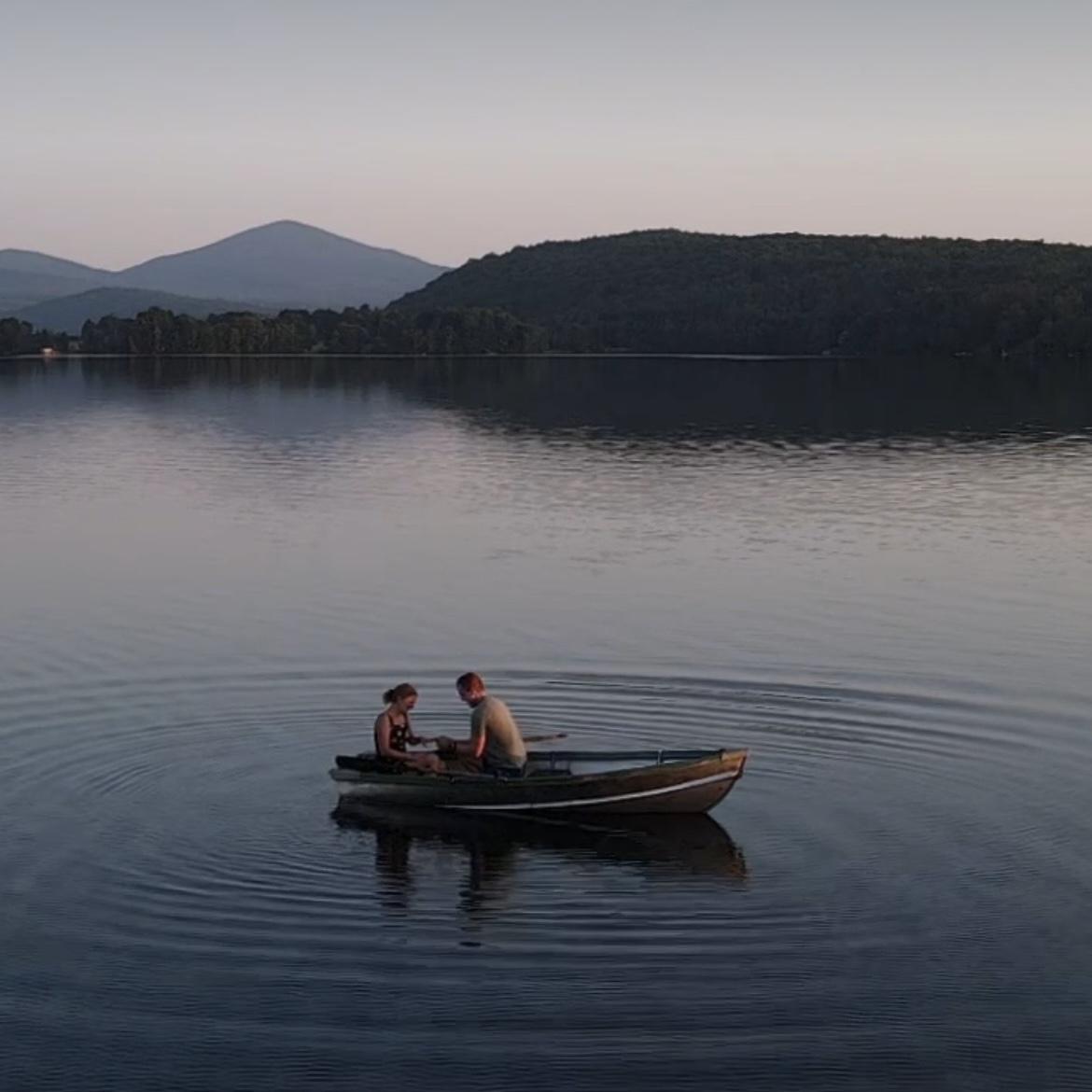 Bradley asking Maureen to Marry him on Echo Lake (her favorite place) at sunset with her cousins on kayaks around her and the rest of her family on shore