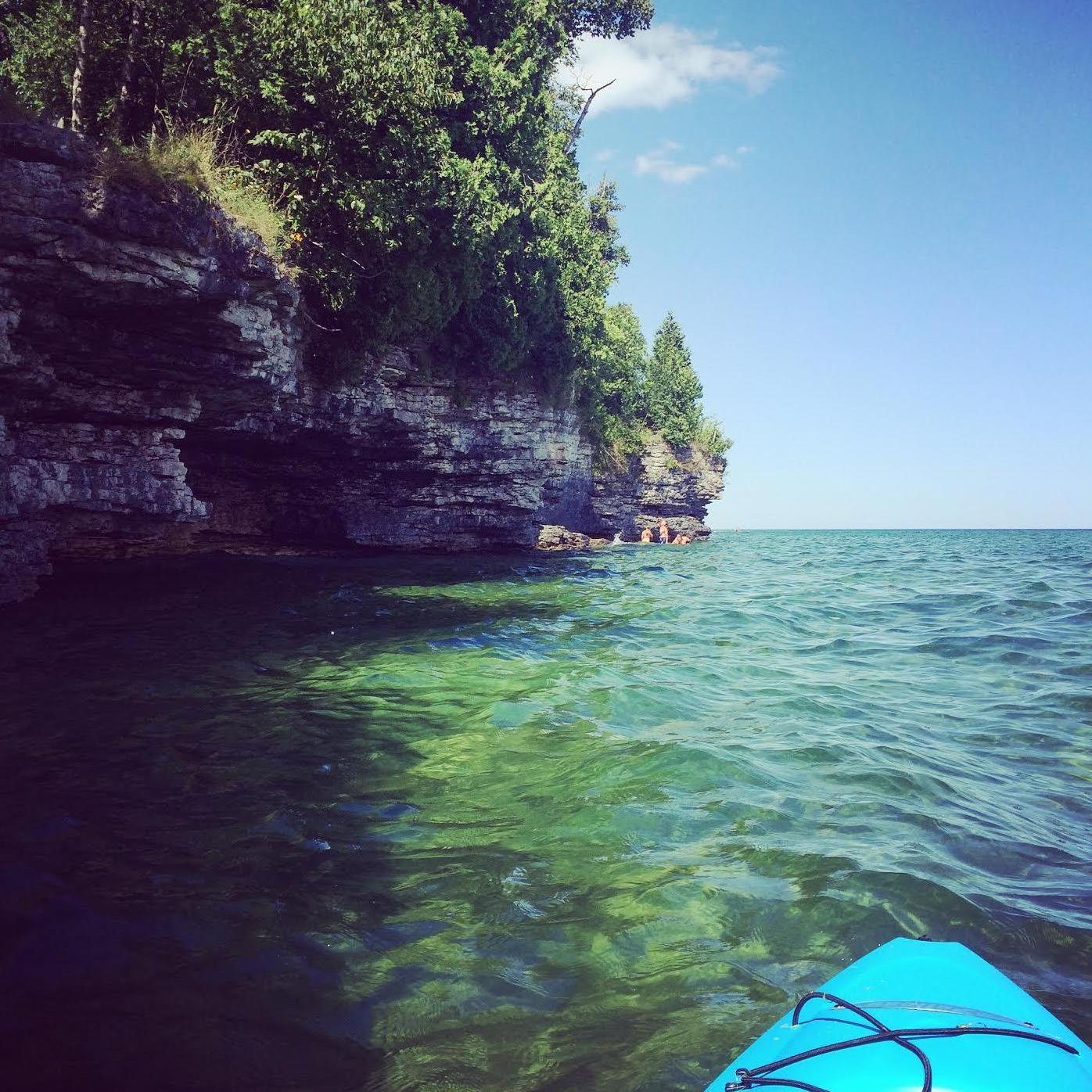 Kayaking Cave Point together. We never imagined we'd get married on those bluffs!