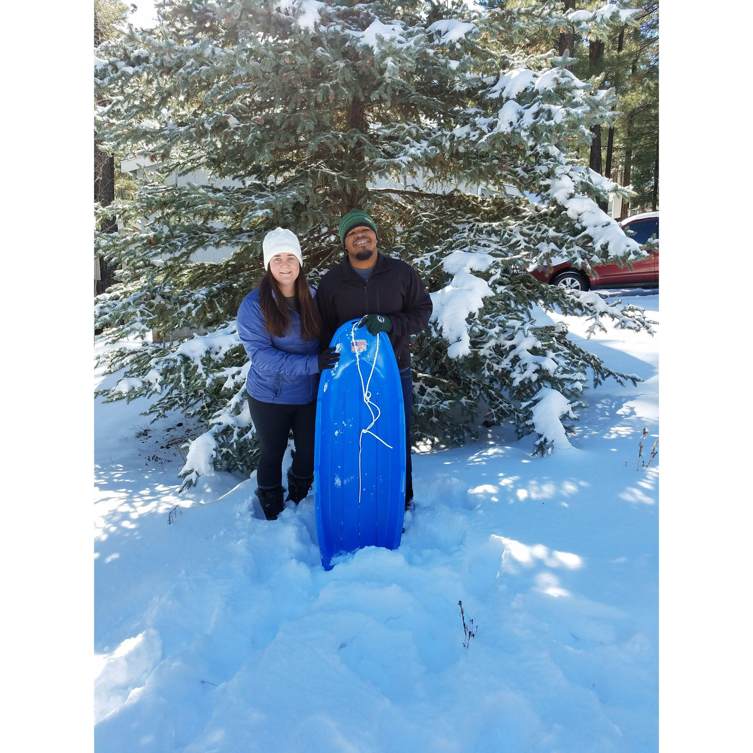 Our first time sledding in the snow together up in Flagstaff