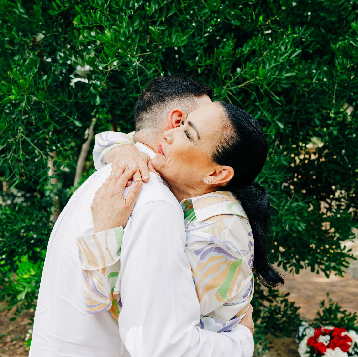 Mother of the bride hugging her son-in-law. Such a happy & loving moment!