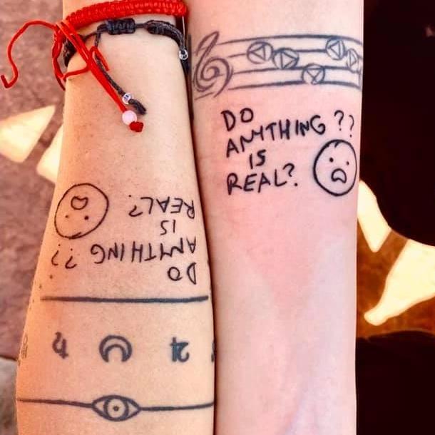 Portland, 2019. Matching tattoos! Anyone who gets the joke is invited to Netflix and chill with us