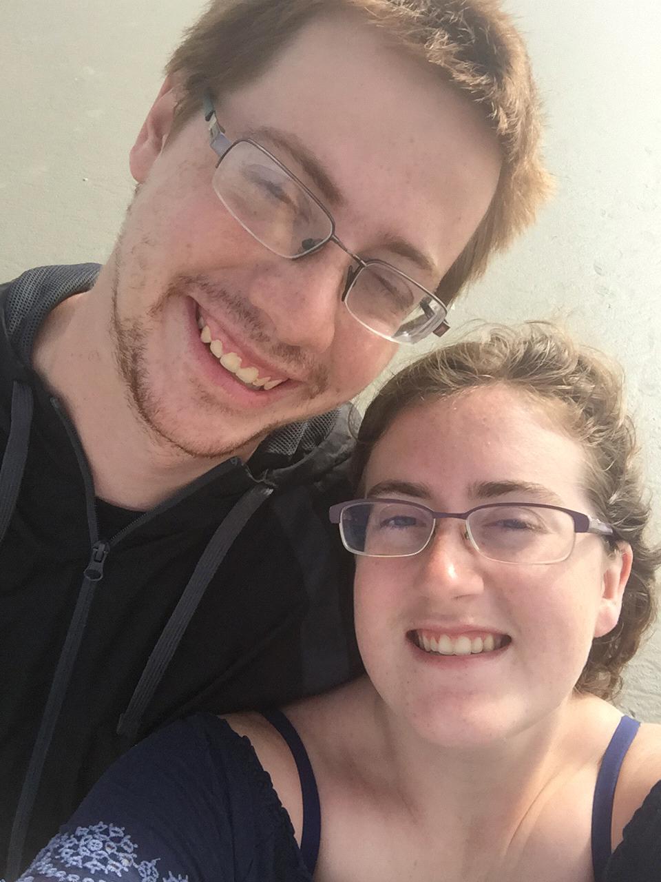 Squinting beach photo, from the day we got engaged - May 2018