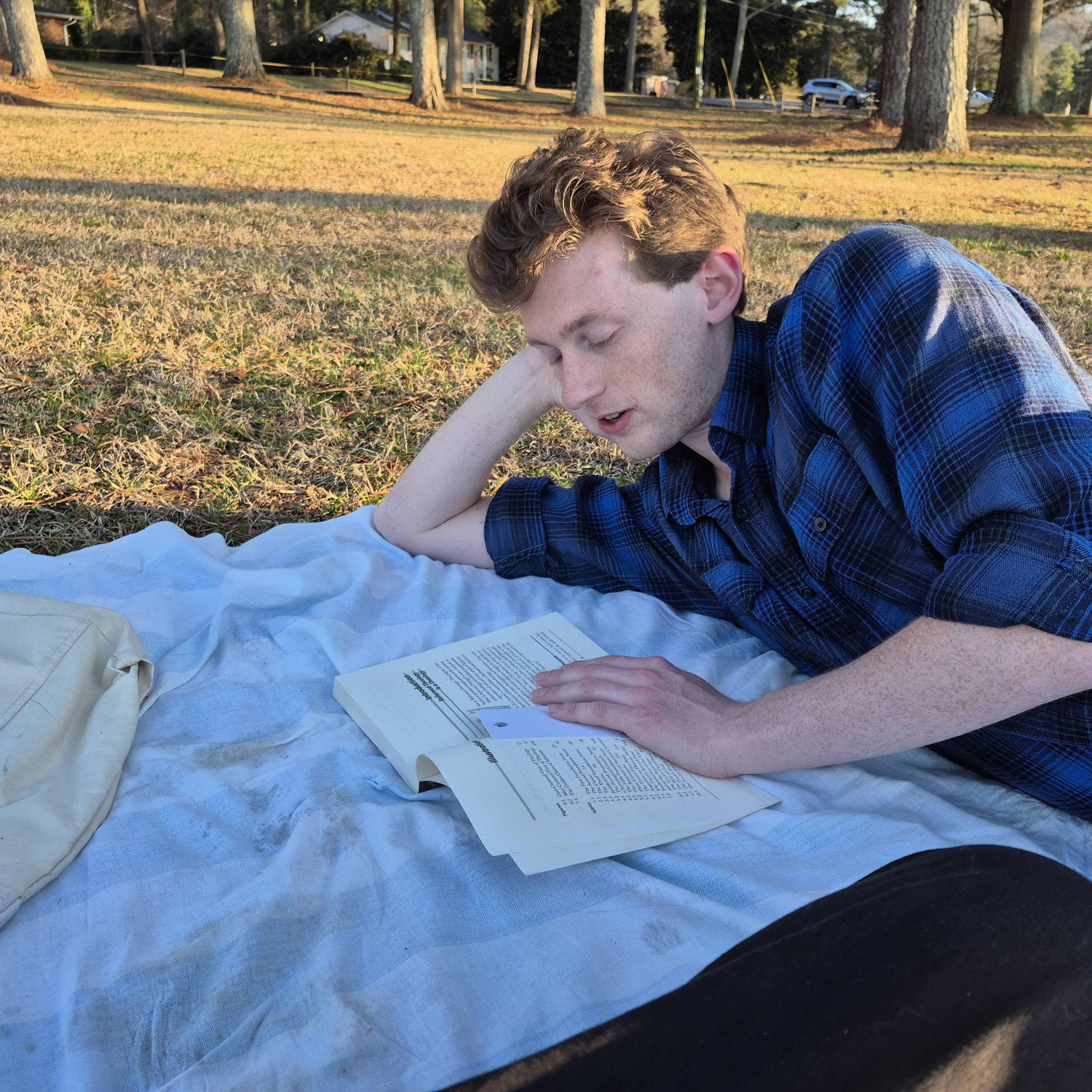 Here's Josiah reading to me beside a lake. Very romantic.