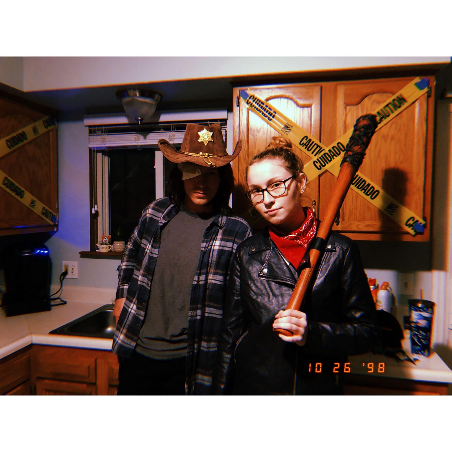 Colleen dressed up as Negan and David dressed up as Carl from The Walking Dead