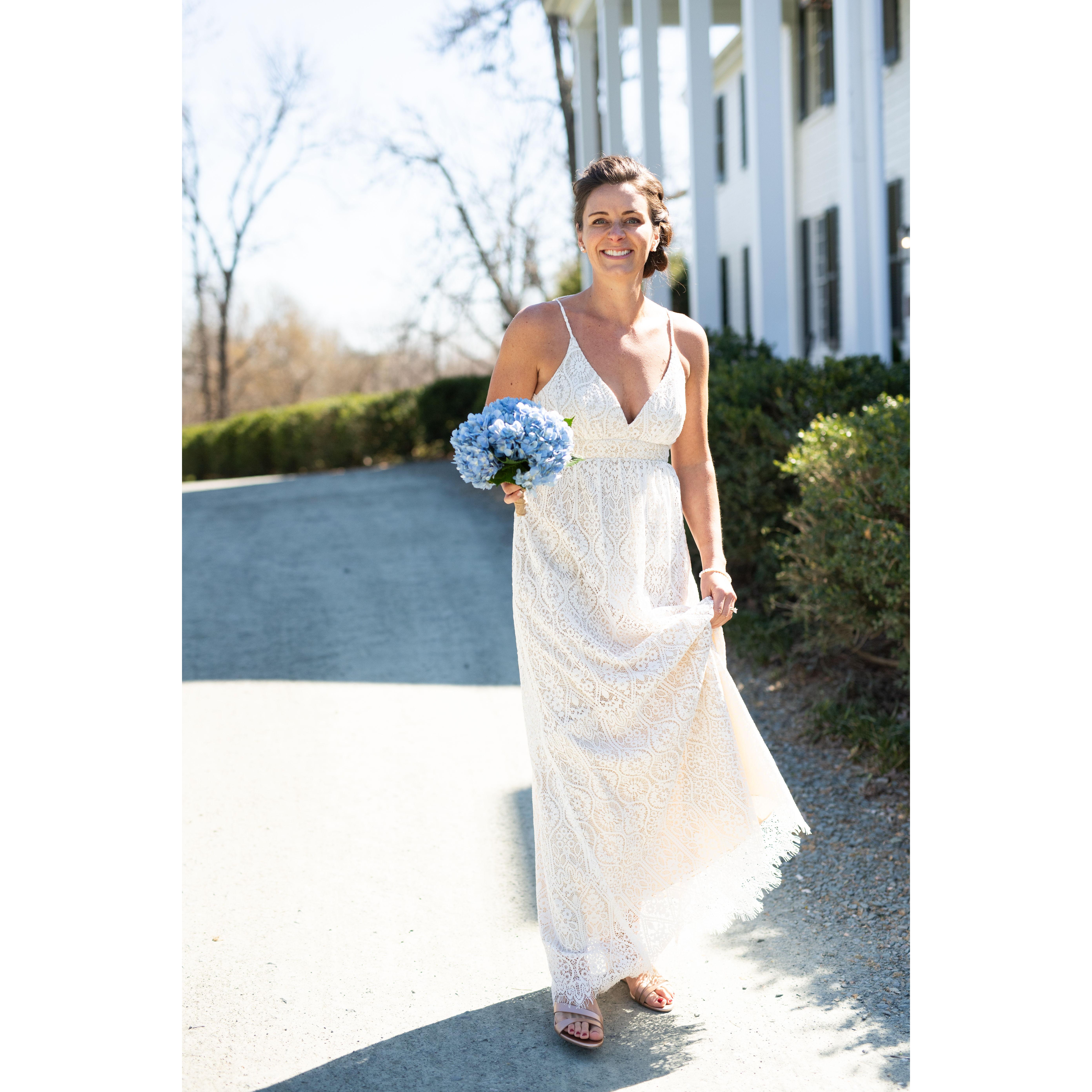 Sarah walking past the Inn for the first look moment with Daniel