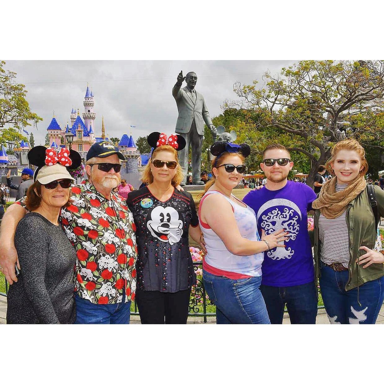 Us at Disneyland in 2019 for Tina and I's college graduation and Mom's birthday!