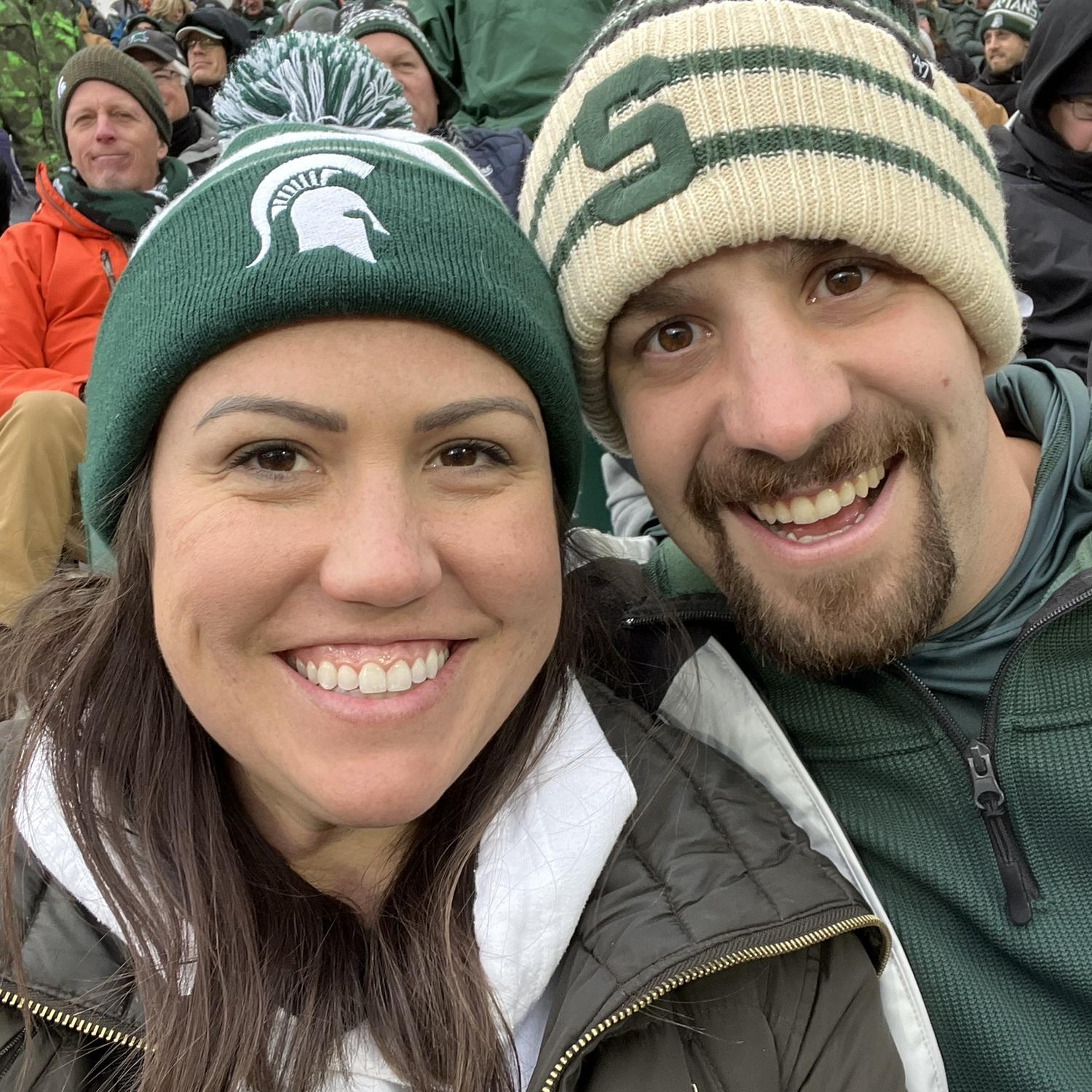 Living in Chicago can’t keep us from our alma mater, as we remain proud season ticket holders. Go green!