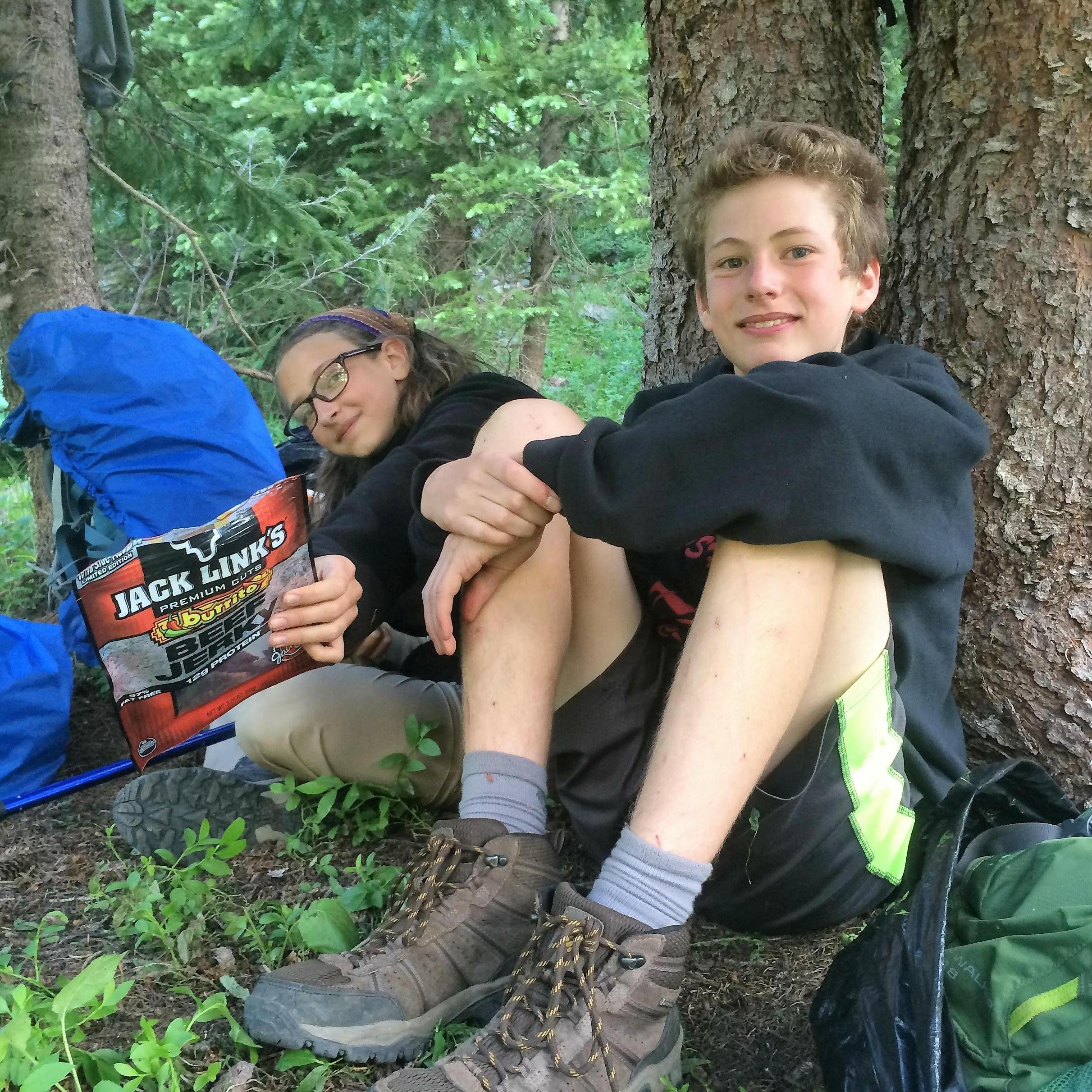 Sharing time and jerky after a long day of backpacking.