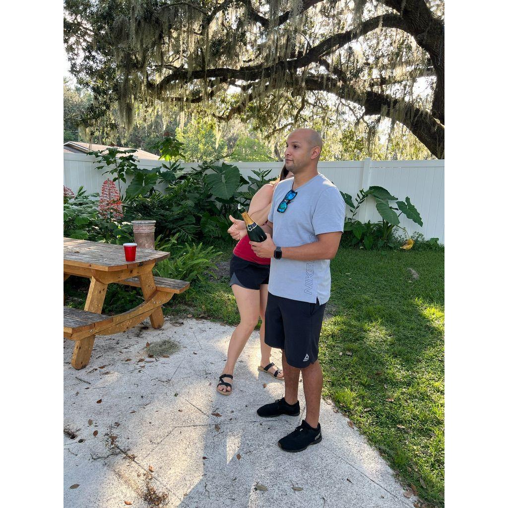 Popping champange after getting the keys to our house