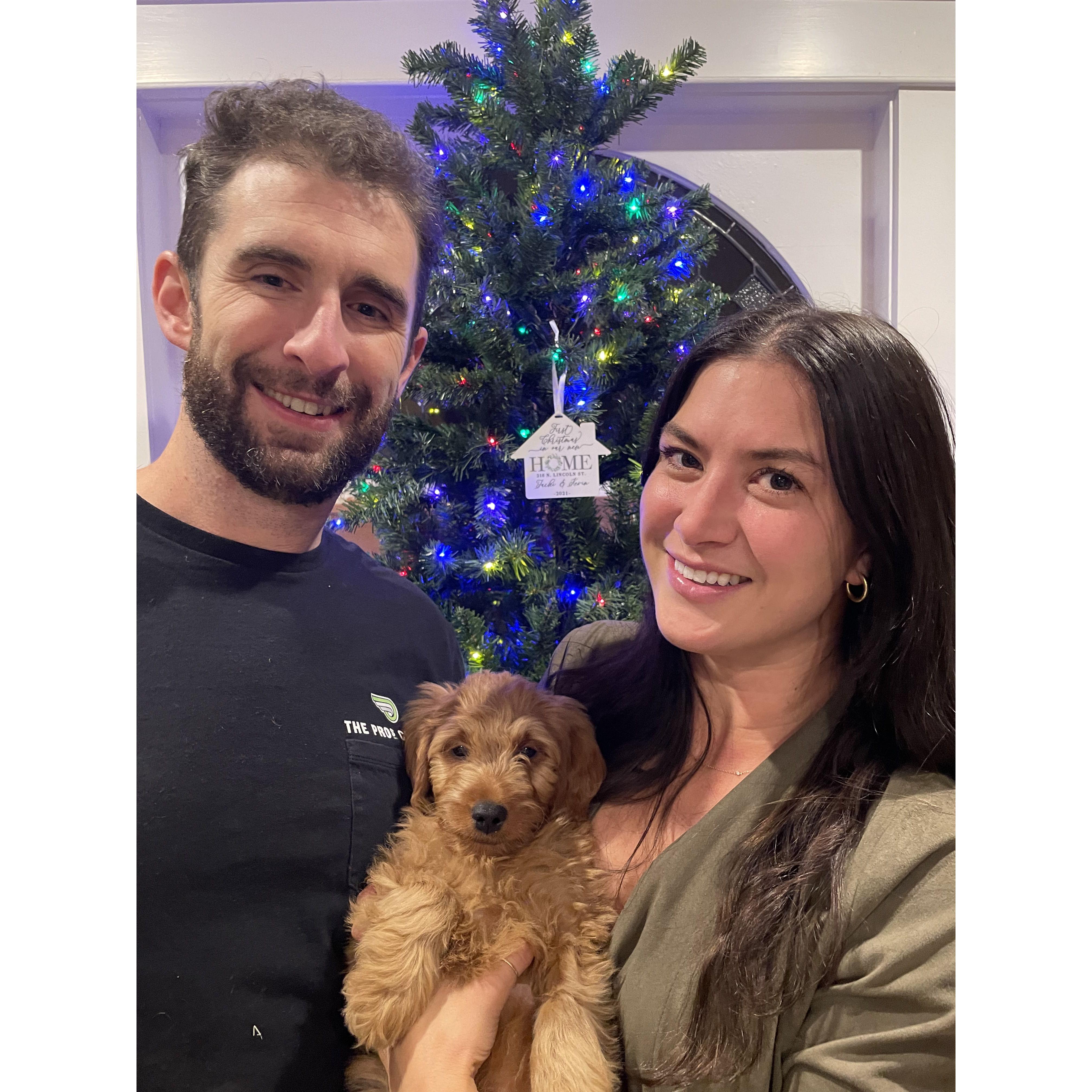 December 2021: Celebrating the holidays in our new home with our new pup, Bo!