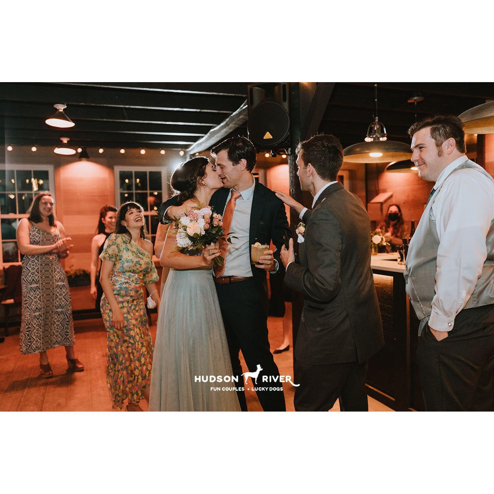 After catching the bouquet at Abby and Nathaniel's wedding, we shared a sweet kiss.