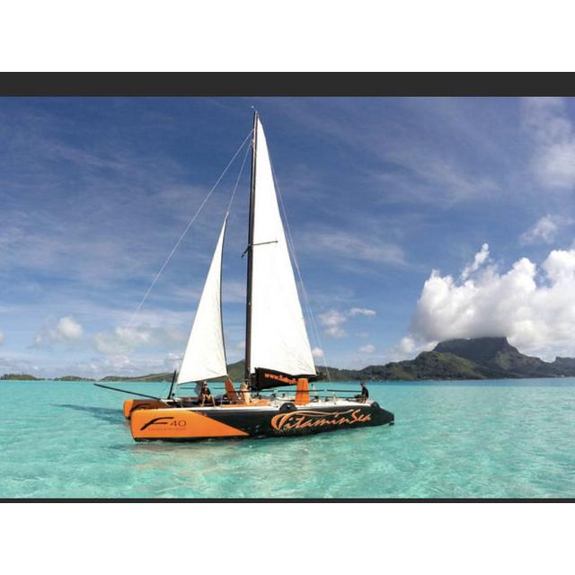 Bora Bora Sailing Catamaran Half Day Tour with Floating Bar