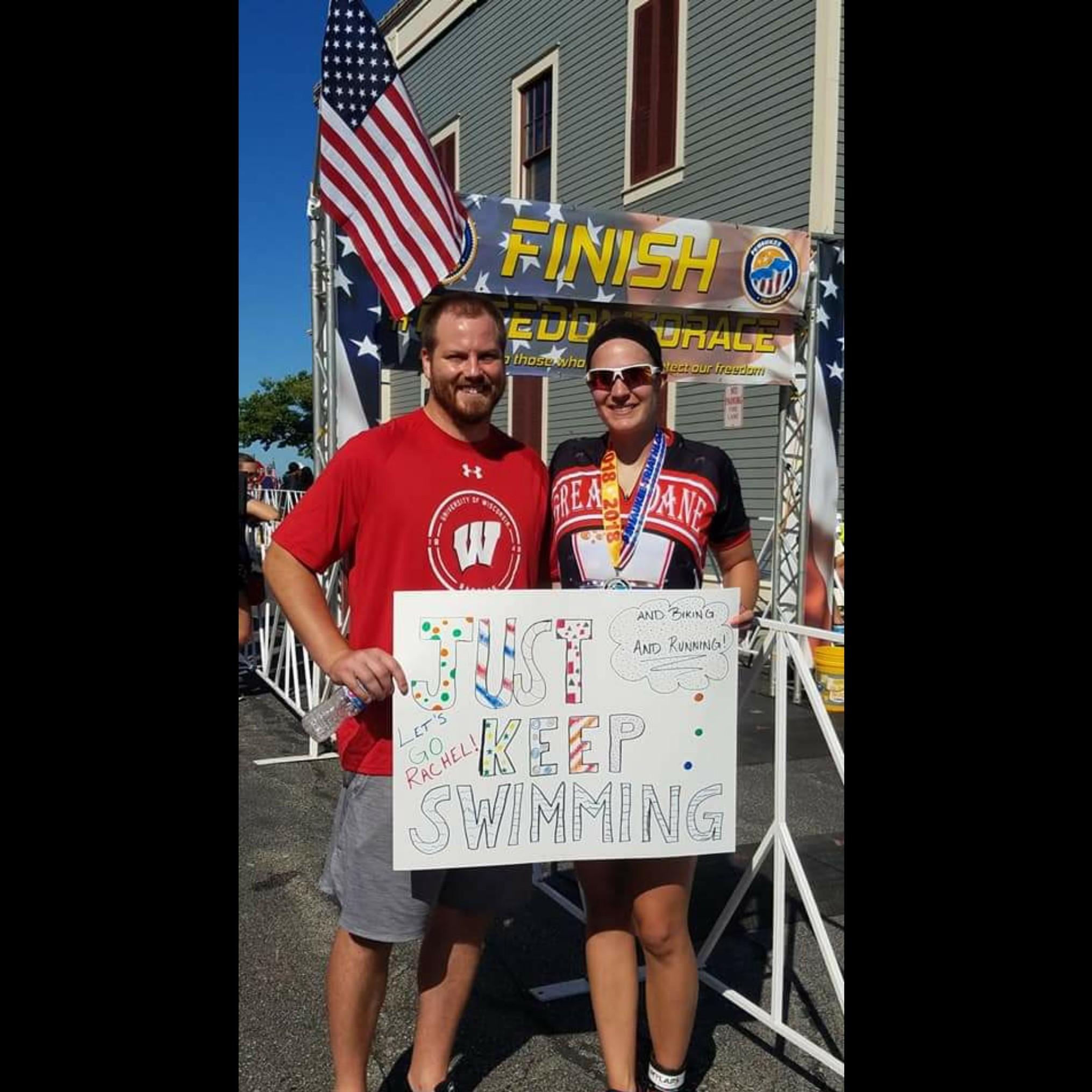 V made a sign and cheered Rachel on at her 2nd ever triathlon