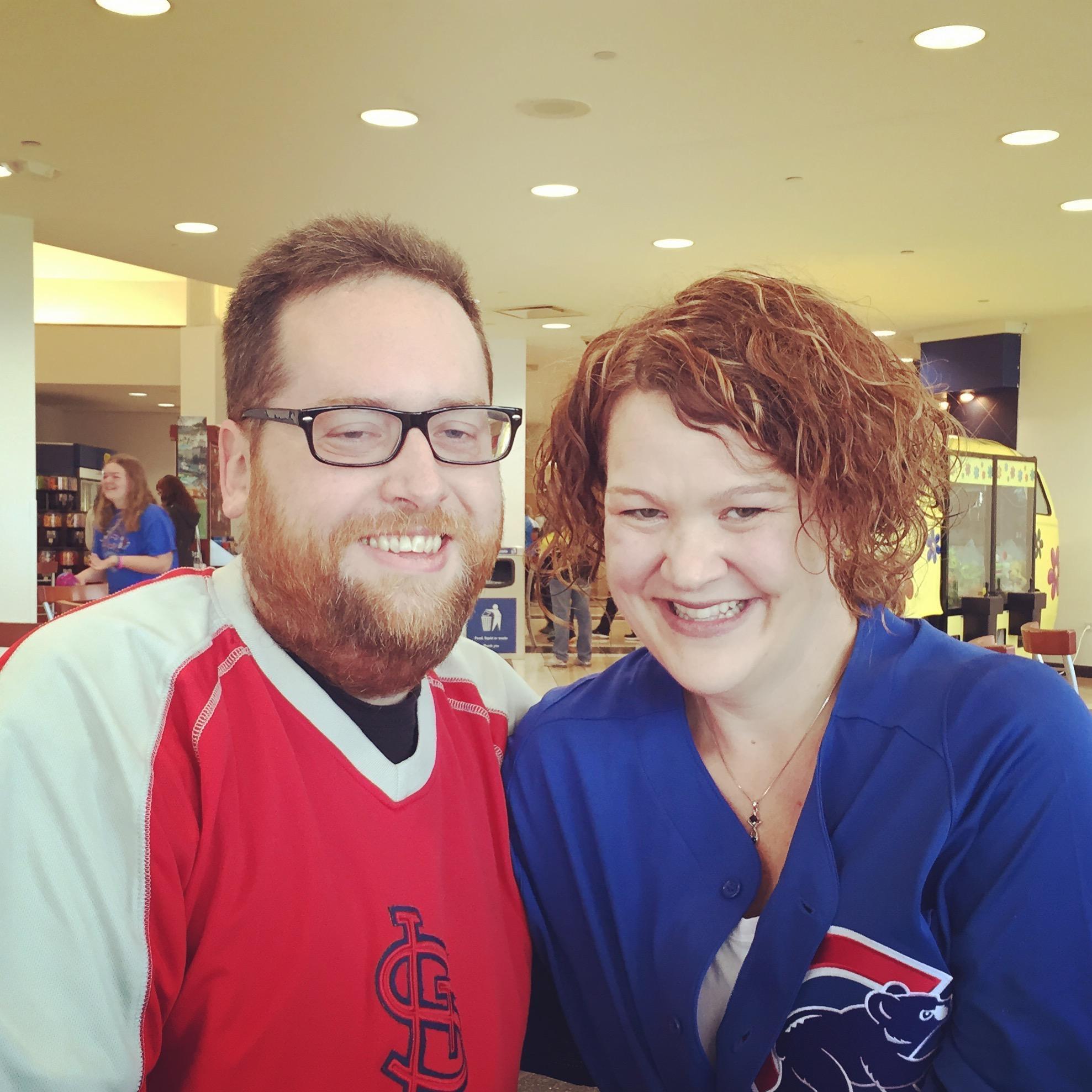 A house divided, but still smiling! On a bus trip to see the Cubbies win over the Cardinals at Wrigley Field!