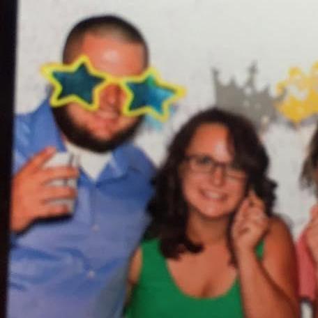 Goofing off in a photo booth at a wedding!