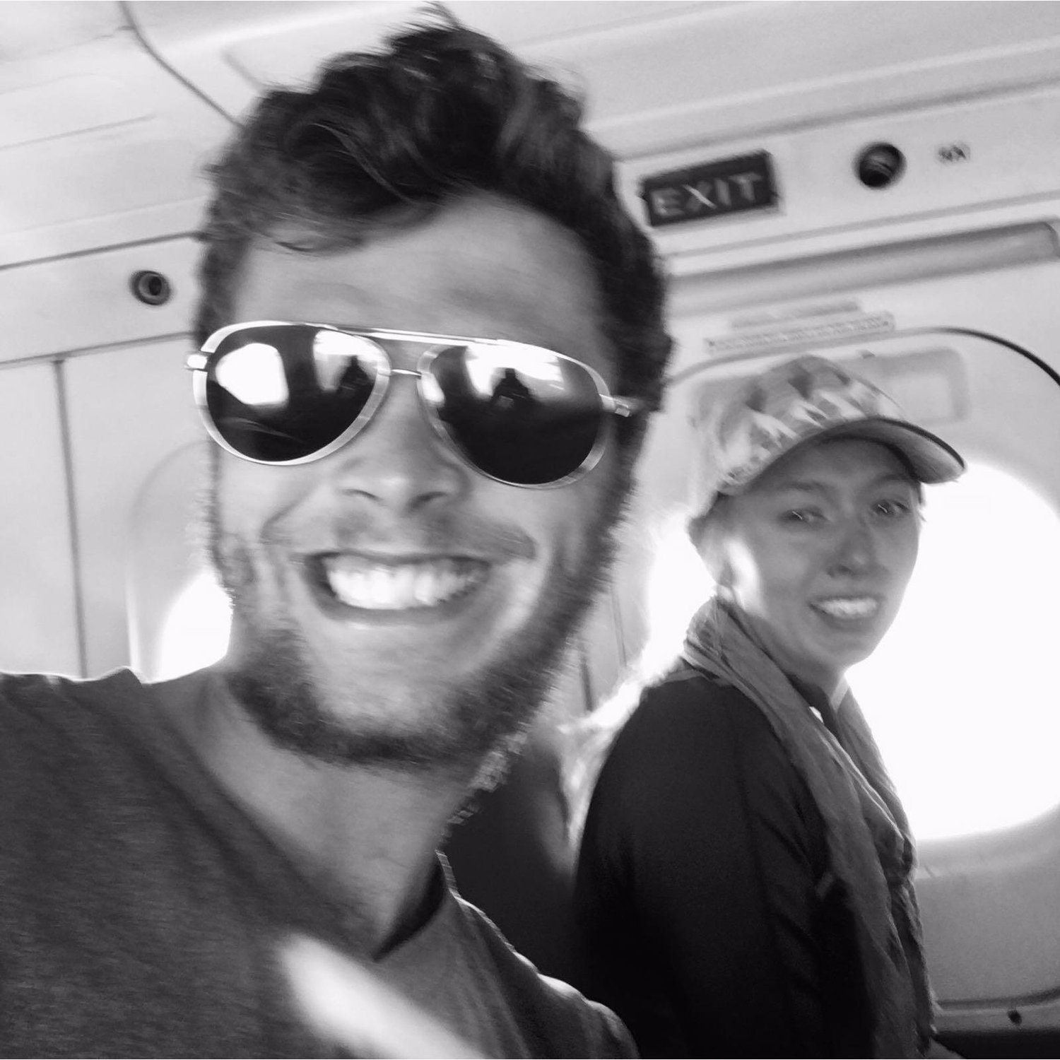 First trip in a small prop plane, landing in the most dangerous 'airport' in the Himalayas. Pearl is crying in this photo.