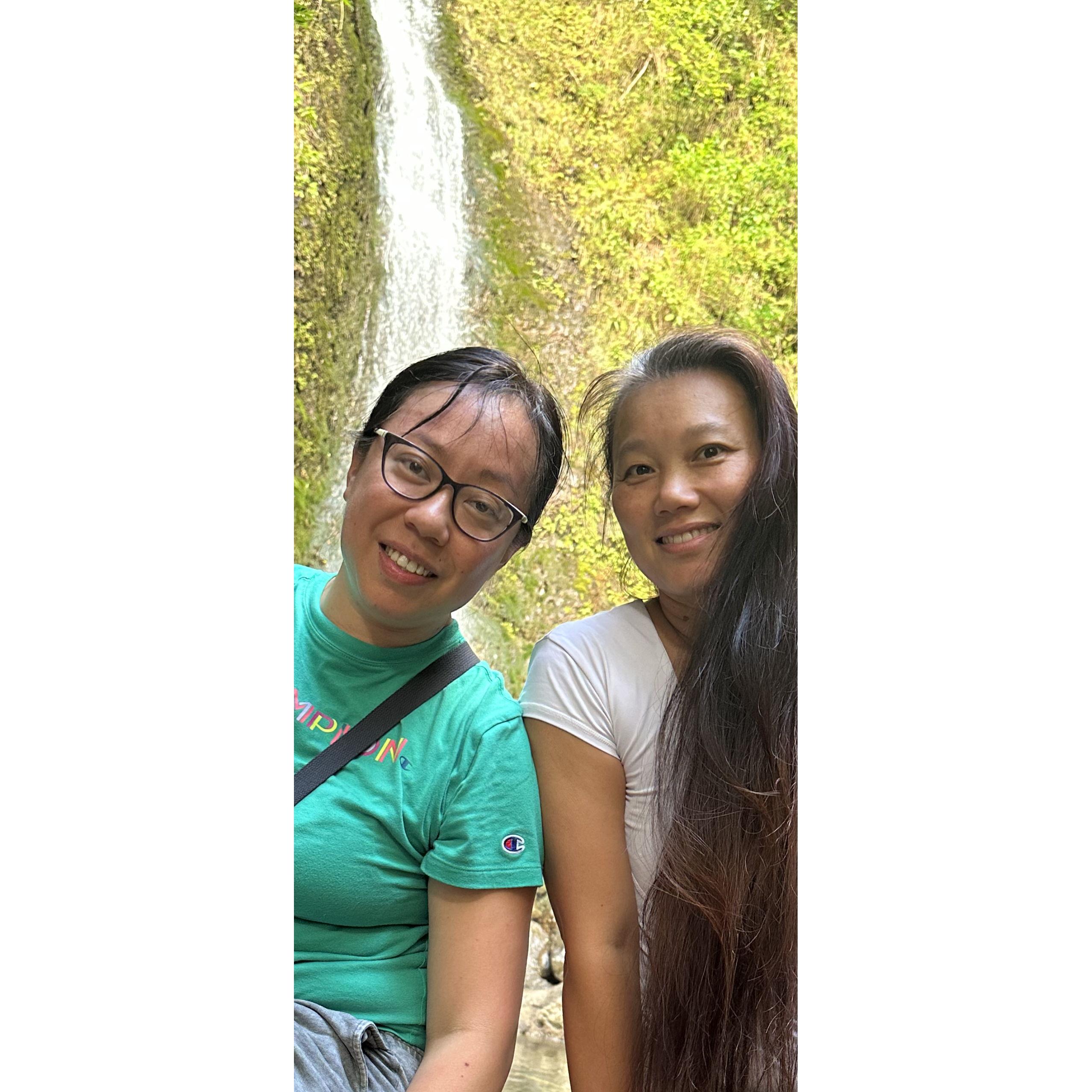 Judy and I hiking up to a fall in Hawaii