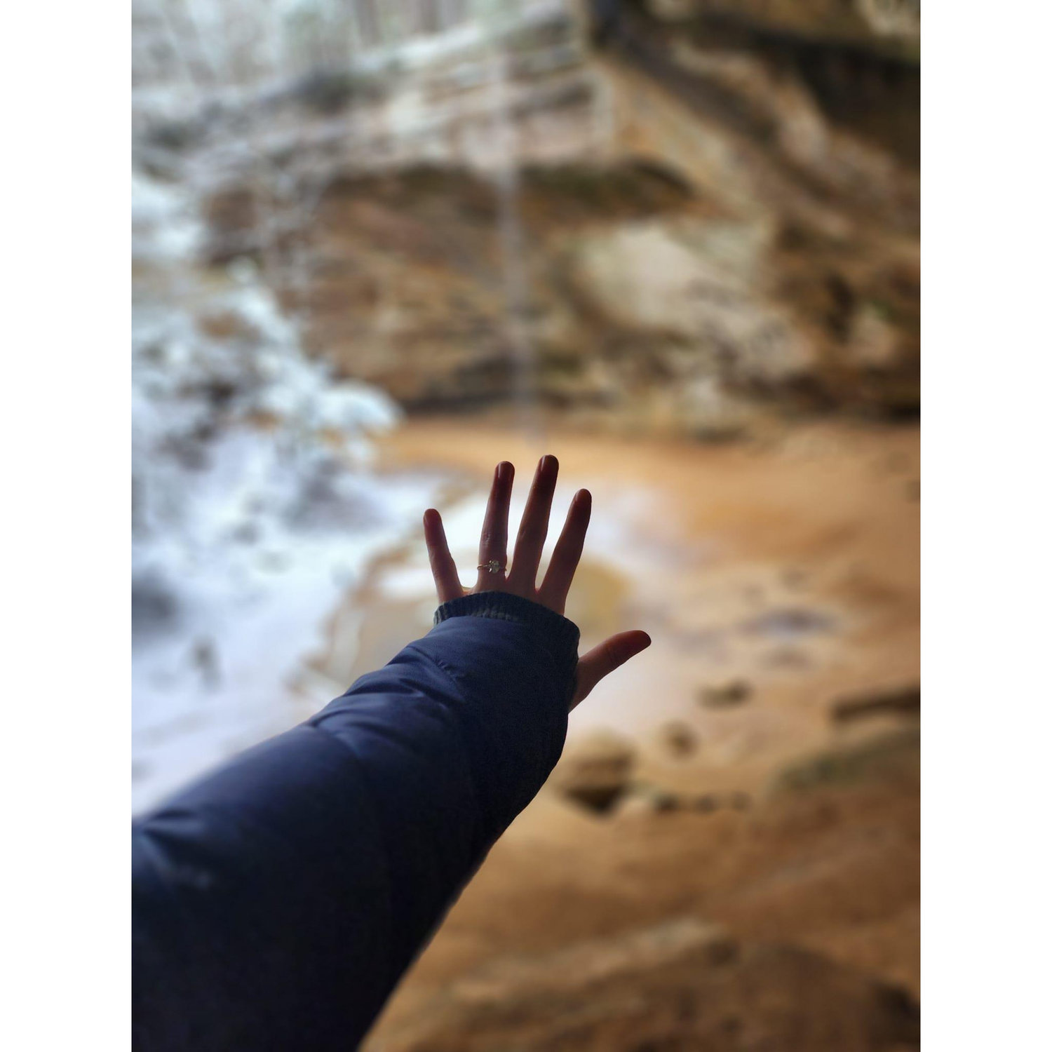 Picture of the ring with the Ash Cave waterfall in the background. The view we had when Victor proposed.