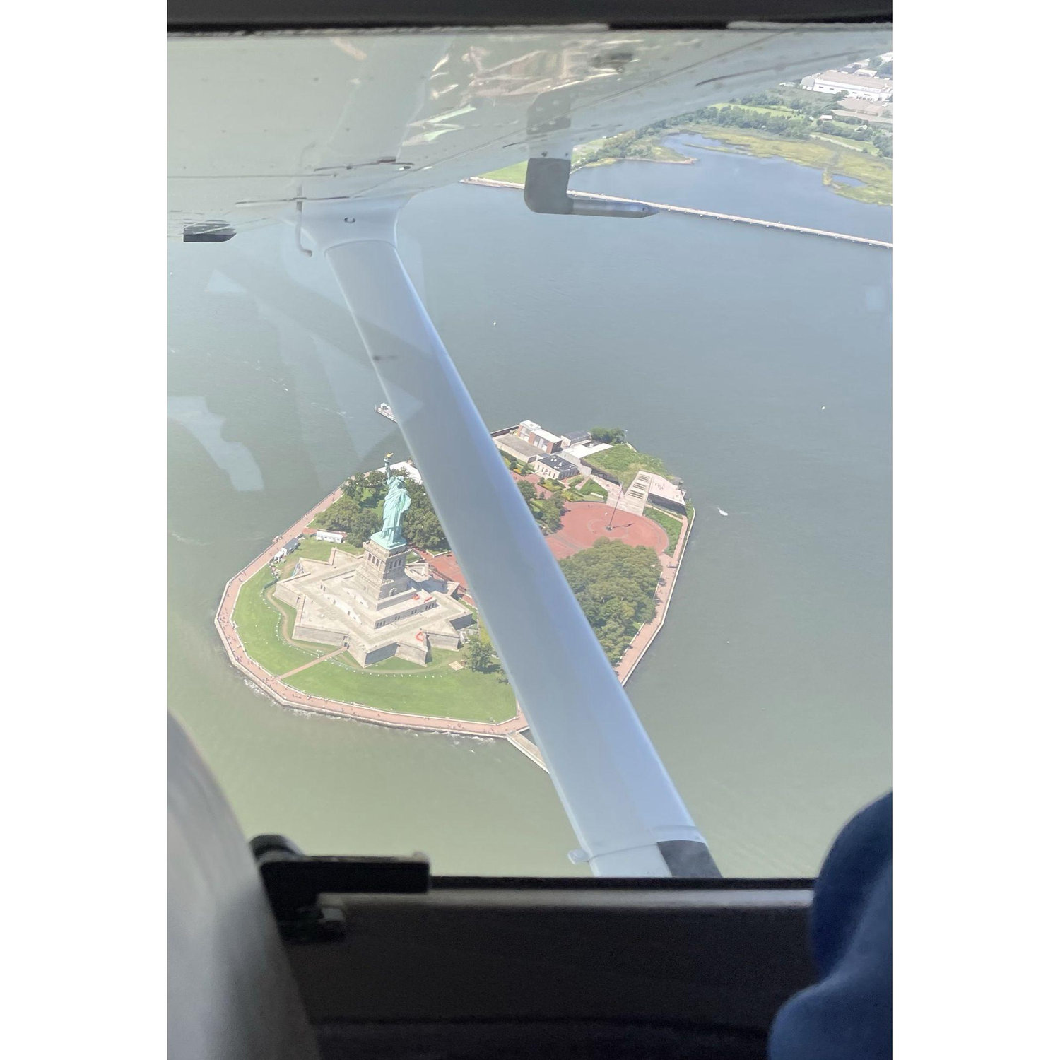 Flying around the lady and up the Hudson River.