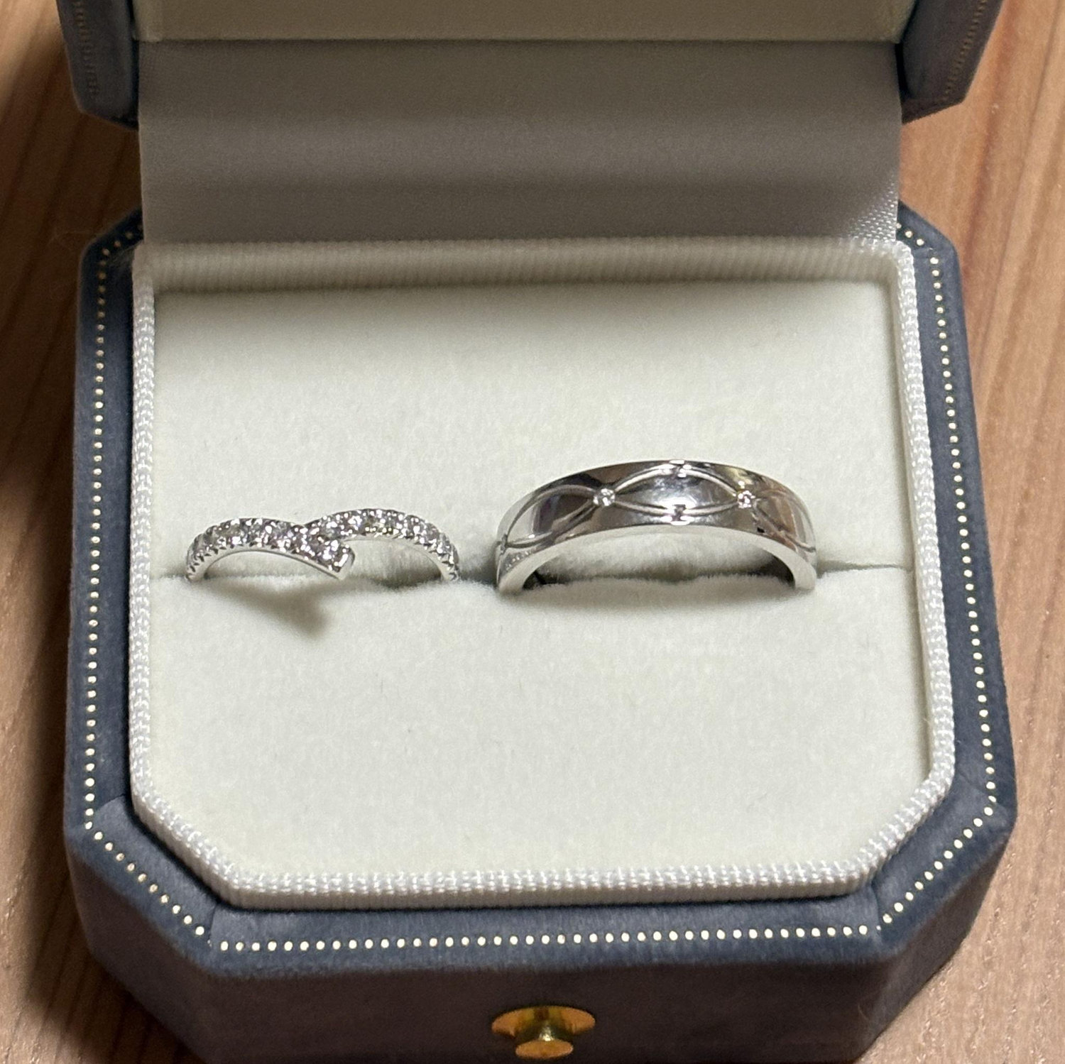 We designed our wedding rings ourselves, with blue and green diamonds inspired by our cats’ eyes. We engraved “Marked Forever” and “Beyond Sequence,” symbolizing a love that goes beyond DNA sequence.