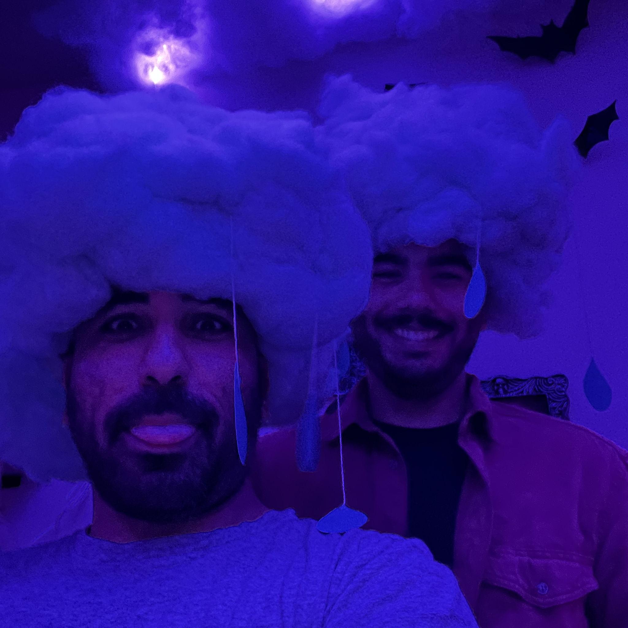 We did not win the costume contest unfortunately, but watch out for us at this year's Halloween party. We were two rain clouds with a stripe of duck tape down our backs (every cloud has its silver lining). Special thanks to the excess of hard hats, poly-fil, and hot glue laying around the house.