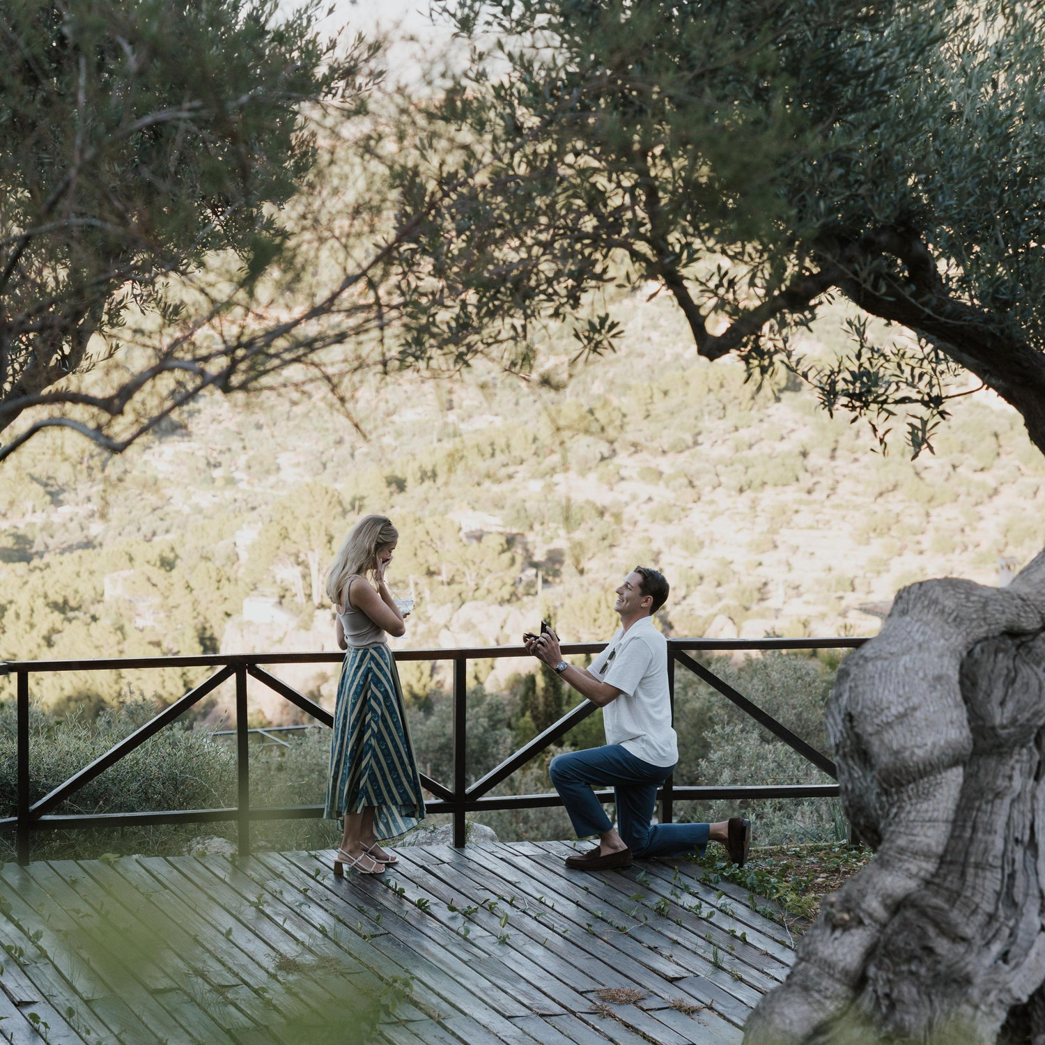 Parker proposed when we took a trip to Spain last fall! We were in Mallorca just outside of the town of Deia, waiting on our dinner reservation when he suggested we go "check out the view".
