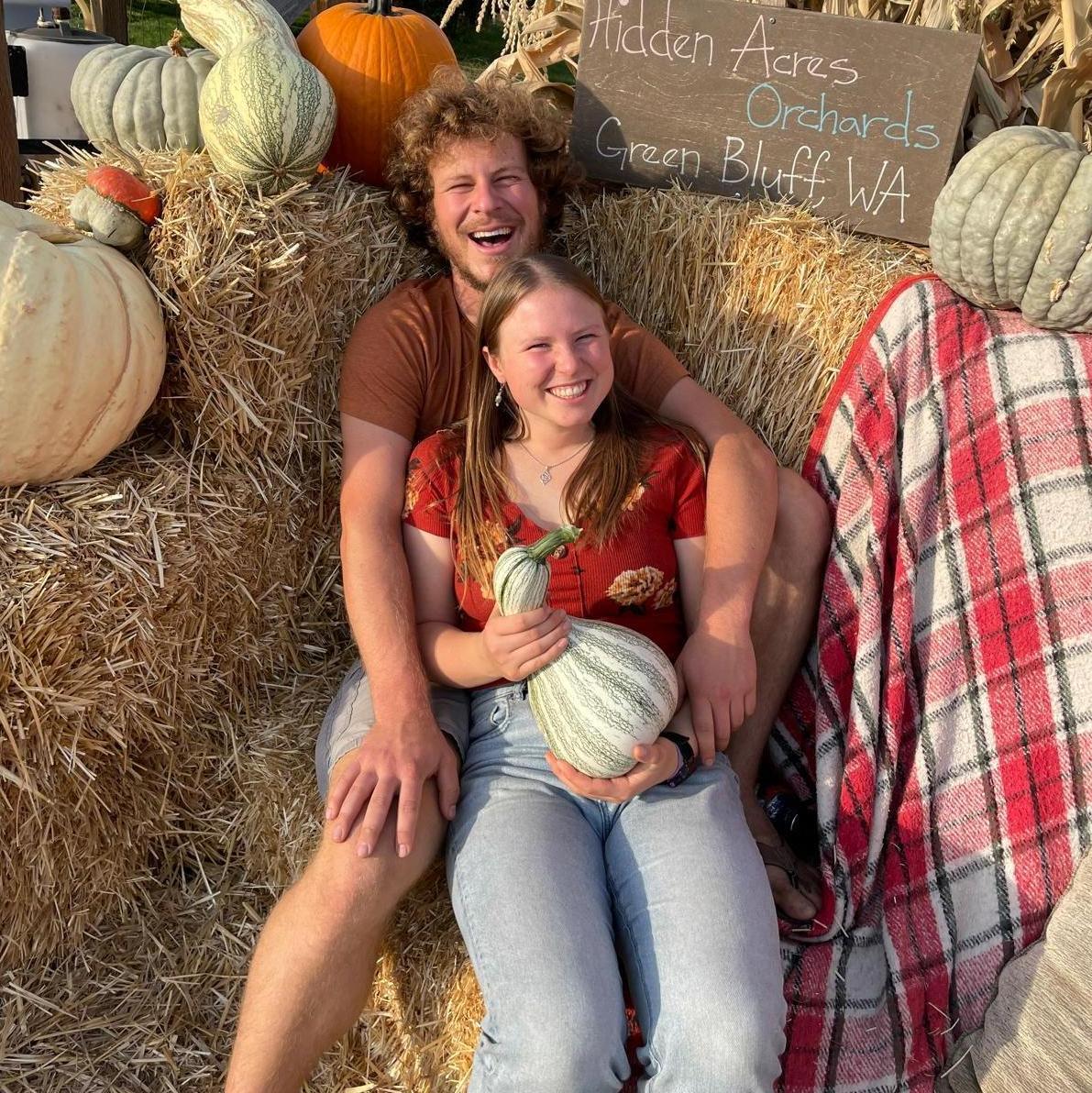 Our beautiful cliche couple photo at a pumpkin farm in fall of 22'