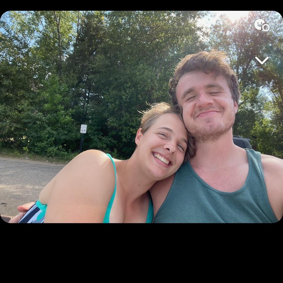 One of our earliest dates —swimming and sunning on Pelican Lake in Breezy Point, MN: August 2021.