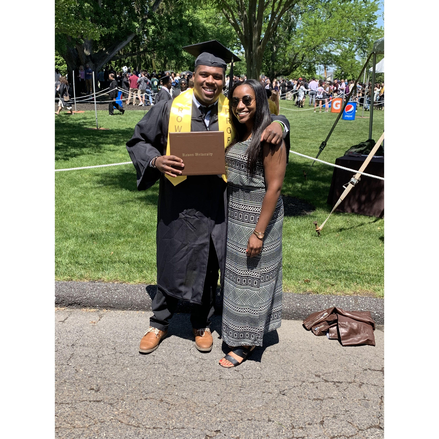 The next summer Alex graduated with his Bachelor's and Daysjia was right by his side.
