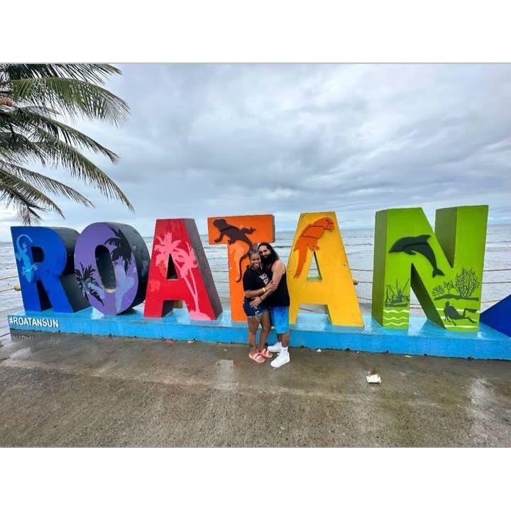 Roatan Honduras. We just knew the van we hitched a ride in to get to the beach was going to break down. LOL!