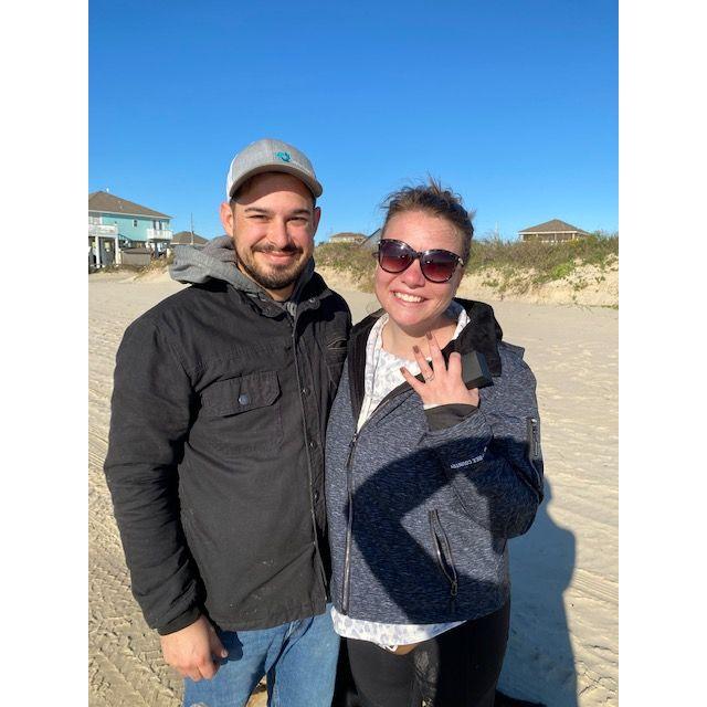 November 2021, where he proposed at Crystal Beach.  He wrote "Will you marry me" in the sand.