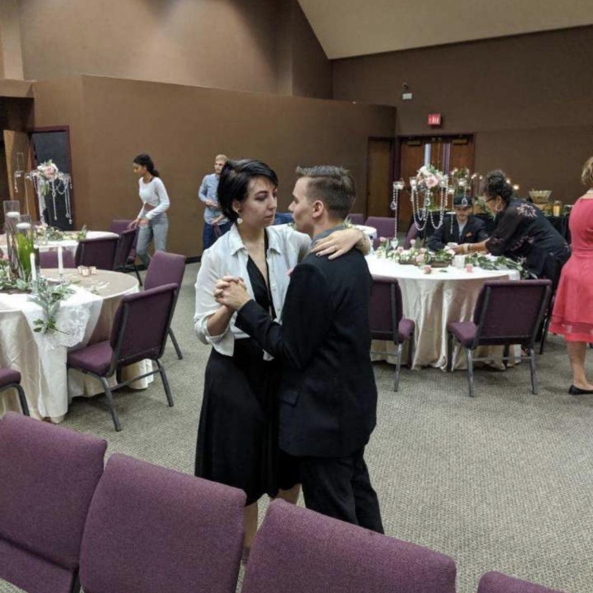 Dancing together at a wedding.