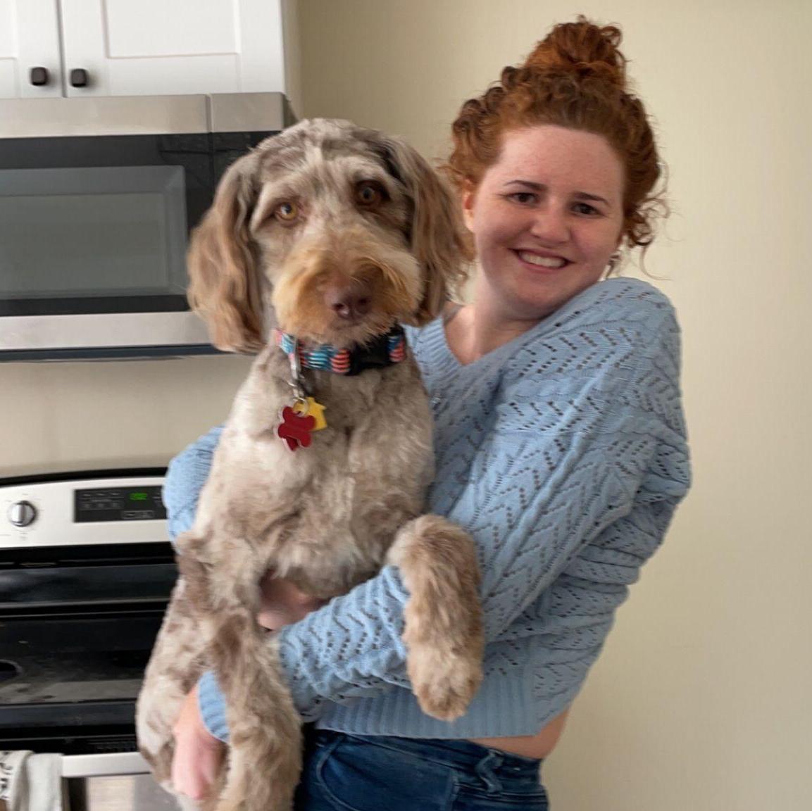 Soon after graduation, we moved in together and adopted our furry first-born, Rocky! Here he is following his first haircut, which he needed... desperately.