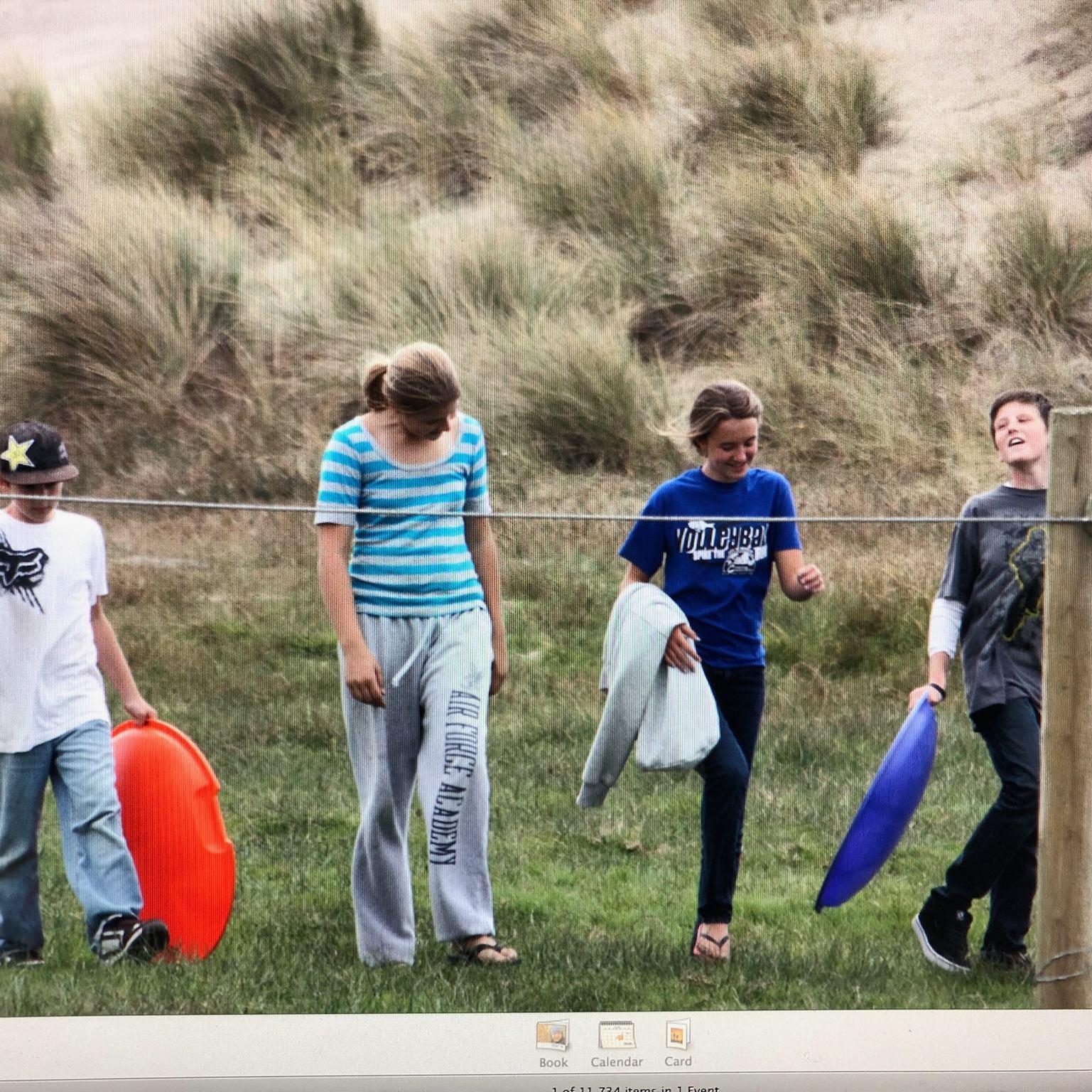 This picture was snapped in 2010 as the four kiddos came back from sliding on the dunes while camping at Dillons Beach. This was the first time Jason and Mackenzie met.