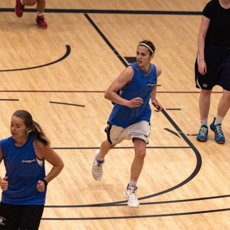 Lucy and Lena hustling down the court for the Splash Sisters