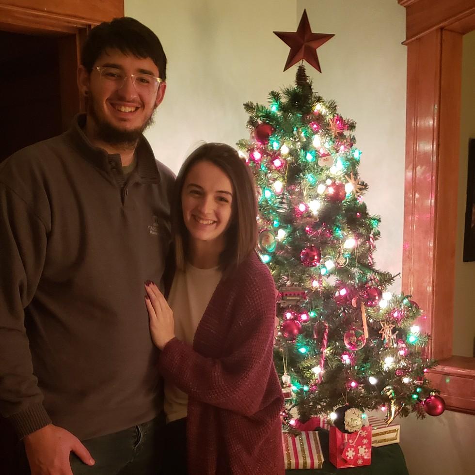 Us with our Christmas tree.