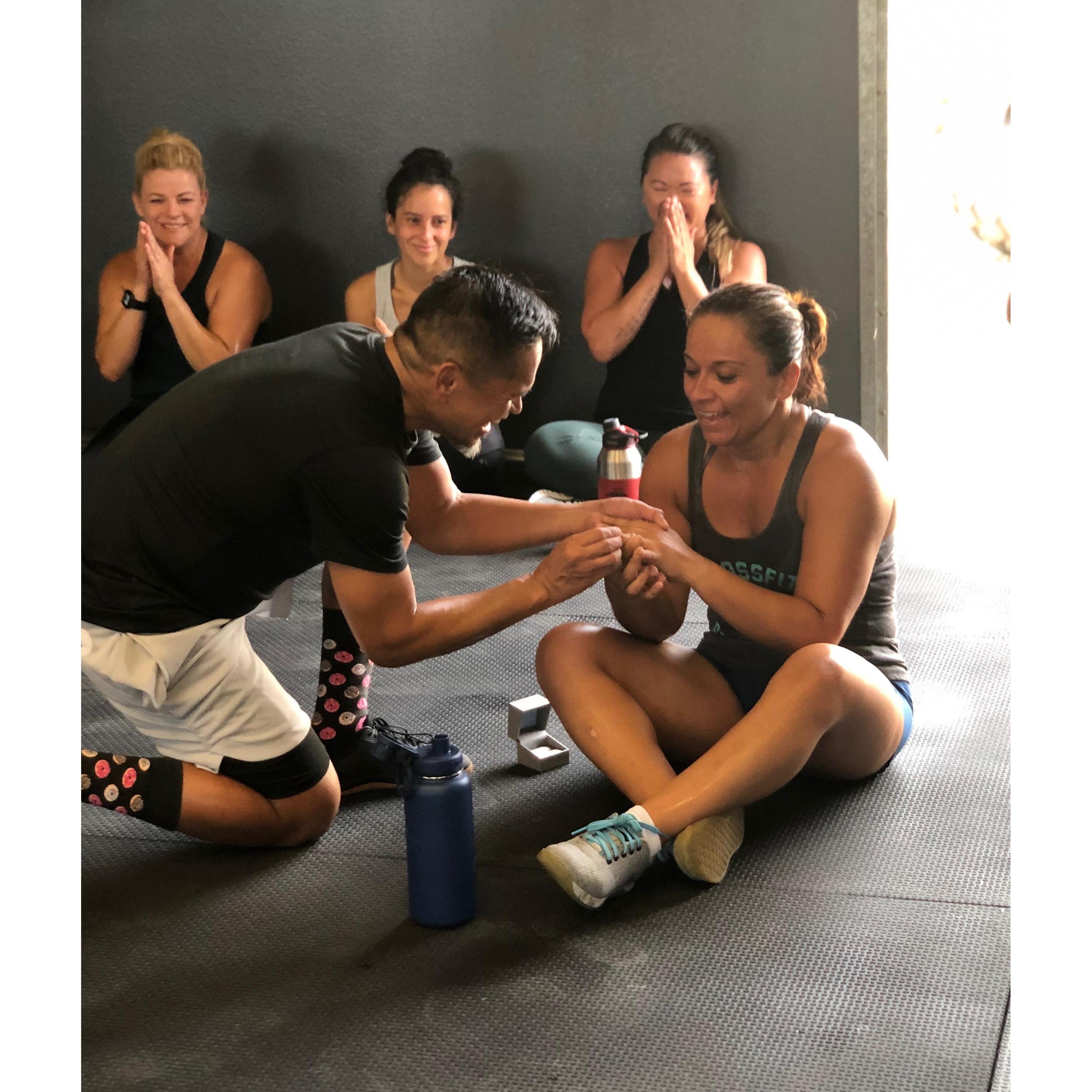 I proposed after a workout tossing wall balls (not her favorite) ... thankfully, she said yes.