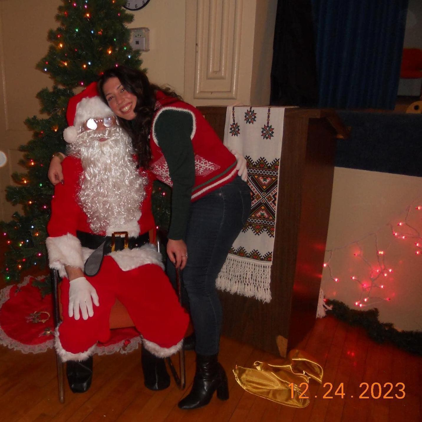 Tony fulfilling Santa duties at the Gigliotti Family Christmas Eve