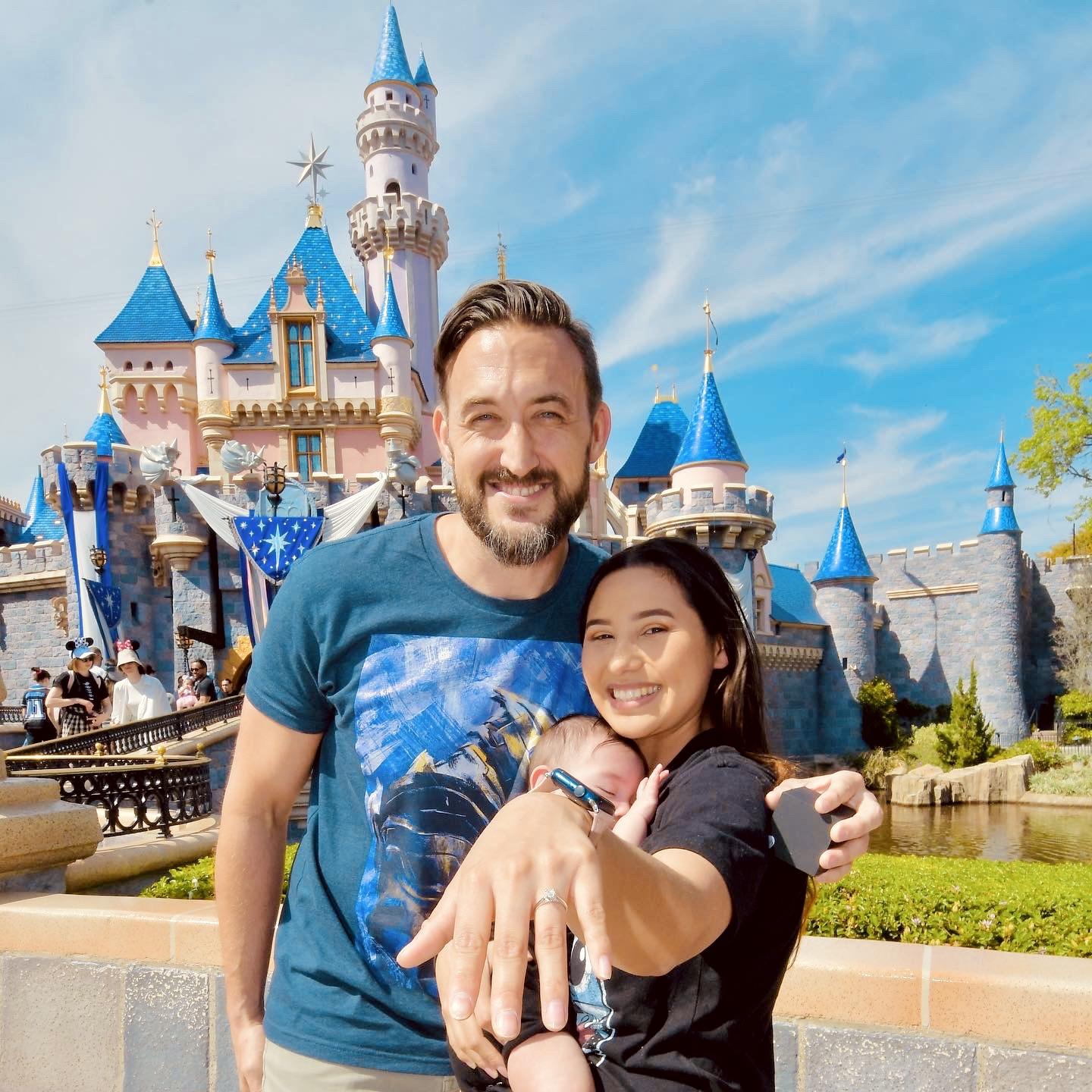 Not long after our boy was born he proposed! And yes at the happiest place on earth. We love theme parks & met at a theme park so what better place than to propose at Disneyland.