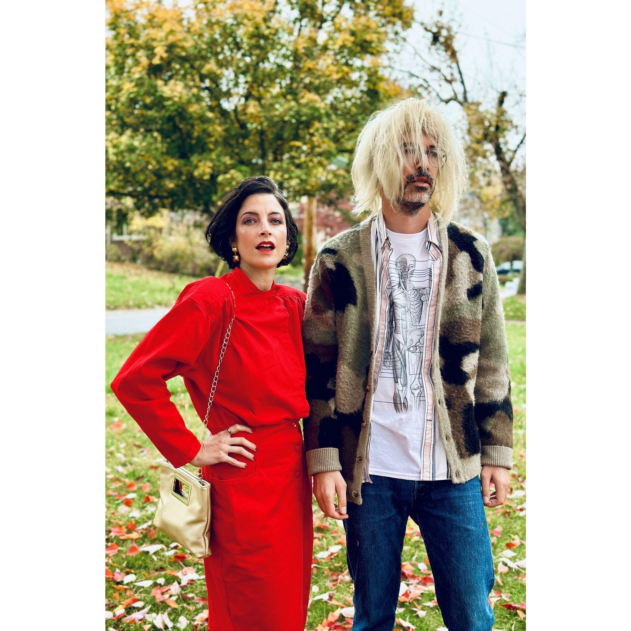 decade-themes halloween party. 80's businesswoman and a kurt cobain type.