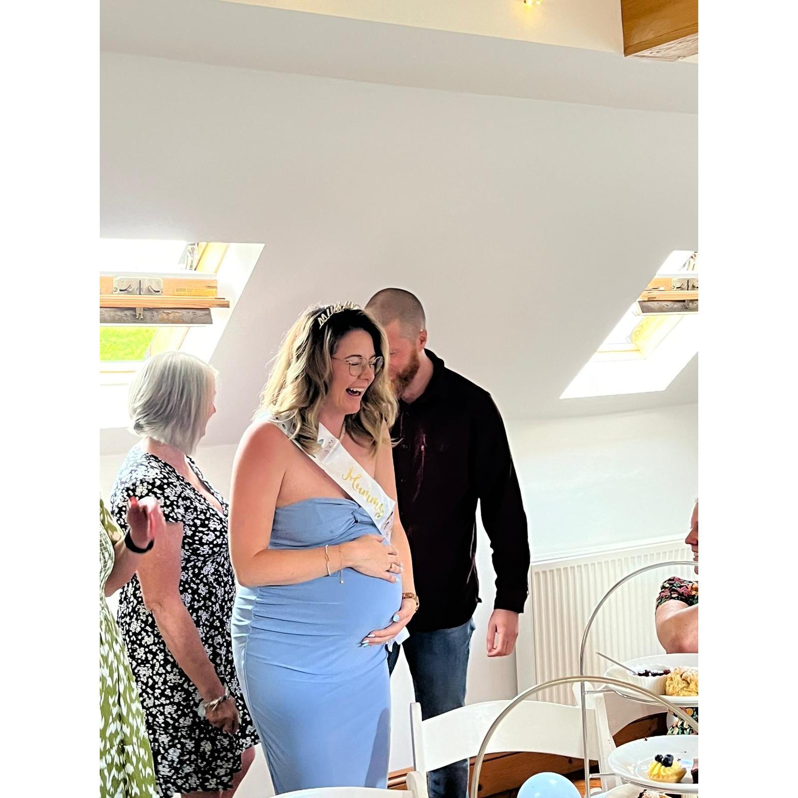 Then came the baby shower. Everyone thought it was just a celebration for Lane… until Ryan walked in, arms full of flowers, and got down on one knee.