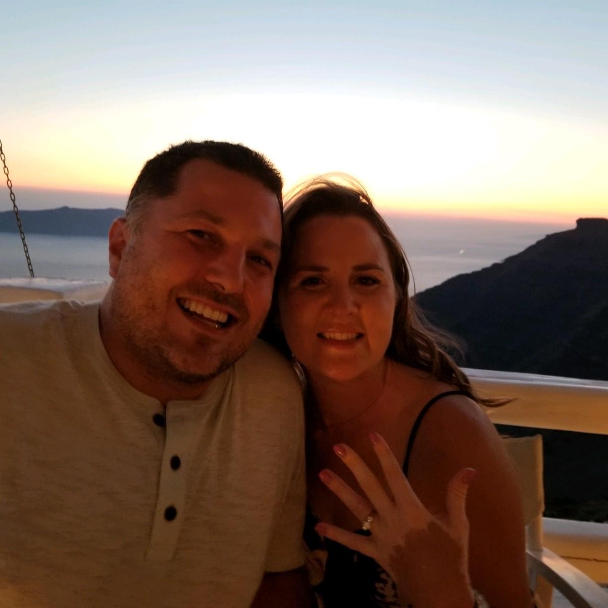 What a breathtaking sunset in Santorini, right after she said "YES!"