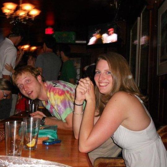 The first picture ever taken of us, many months before we started dating. Here you see the beginning of the theme "Marta smiles while Michael makes a weird face."